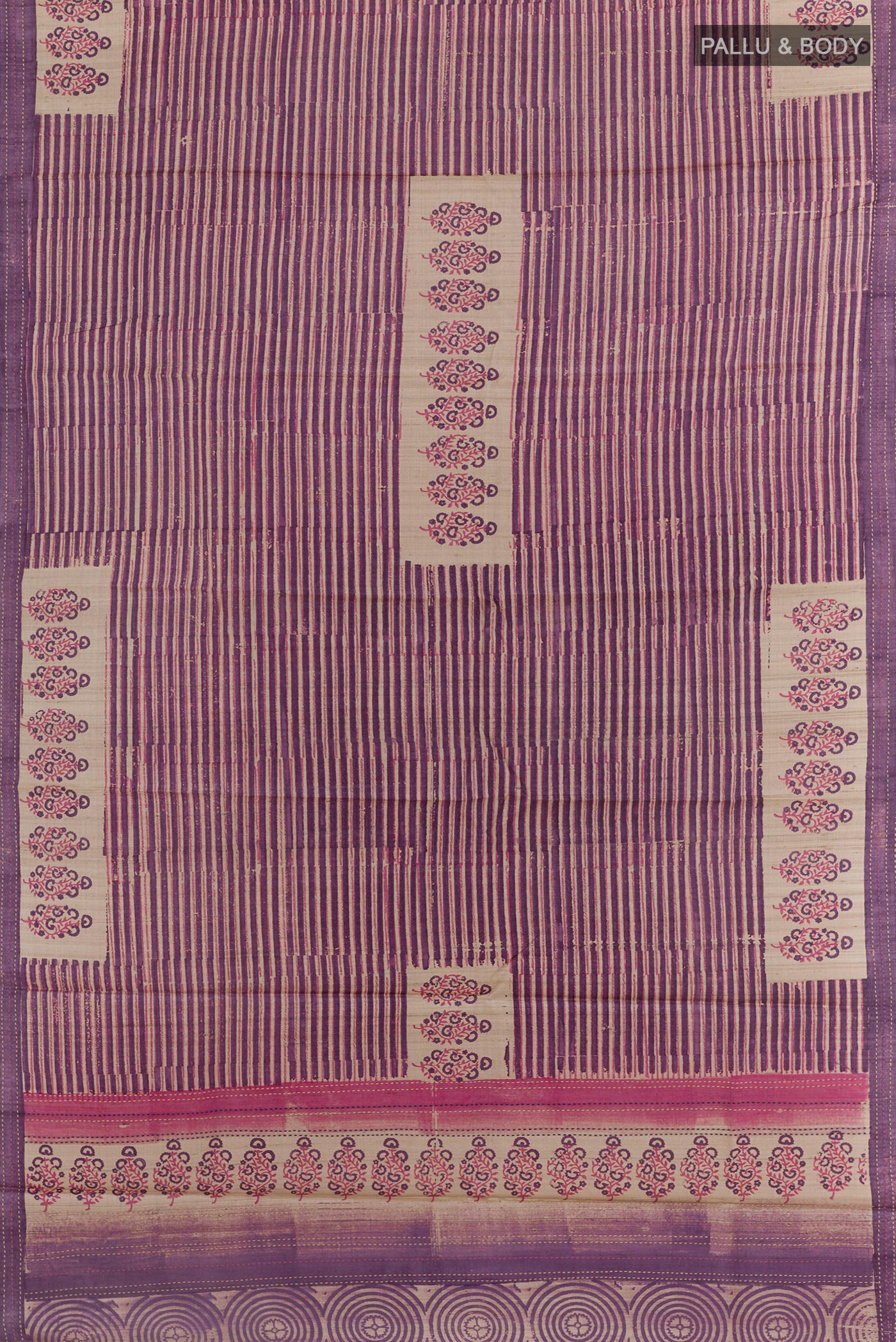 Flat view of Purple Tussar Saree with Printed design on the body and Embroidery Border. 