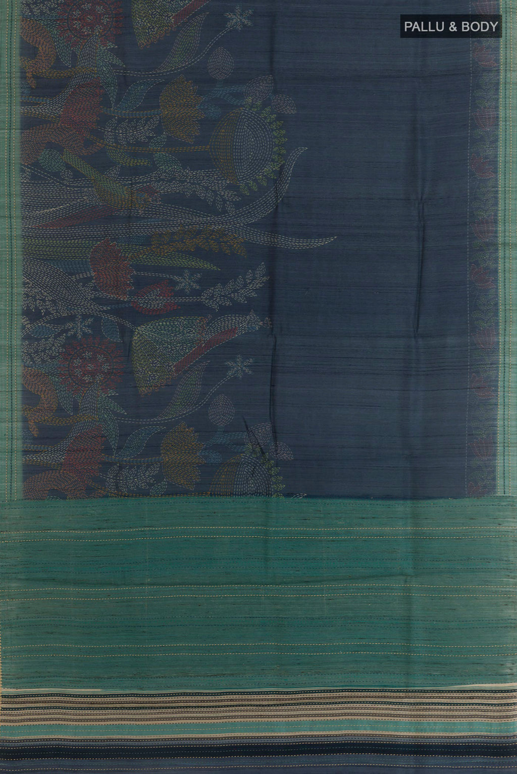 Flat view of Blue Tussar Saree with Printed design on the body and Embroidery Border. 