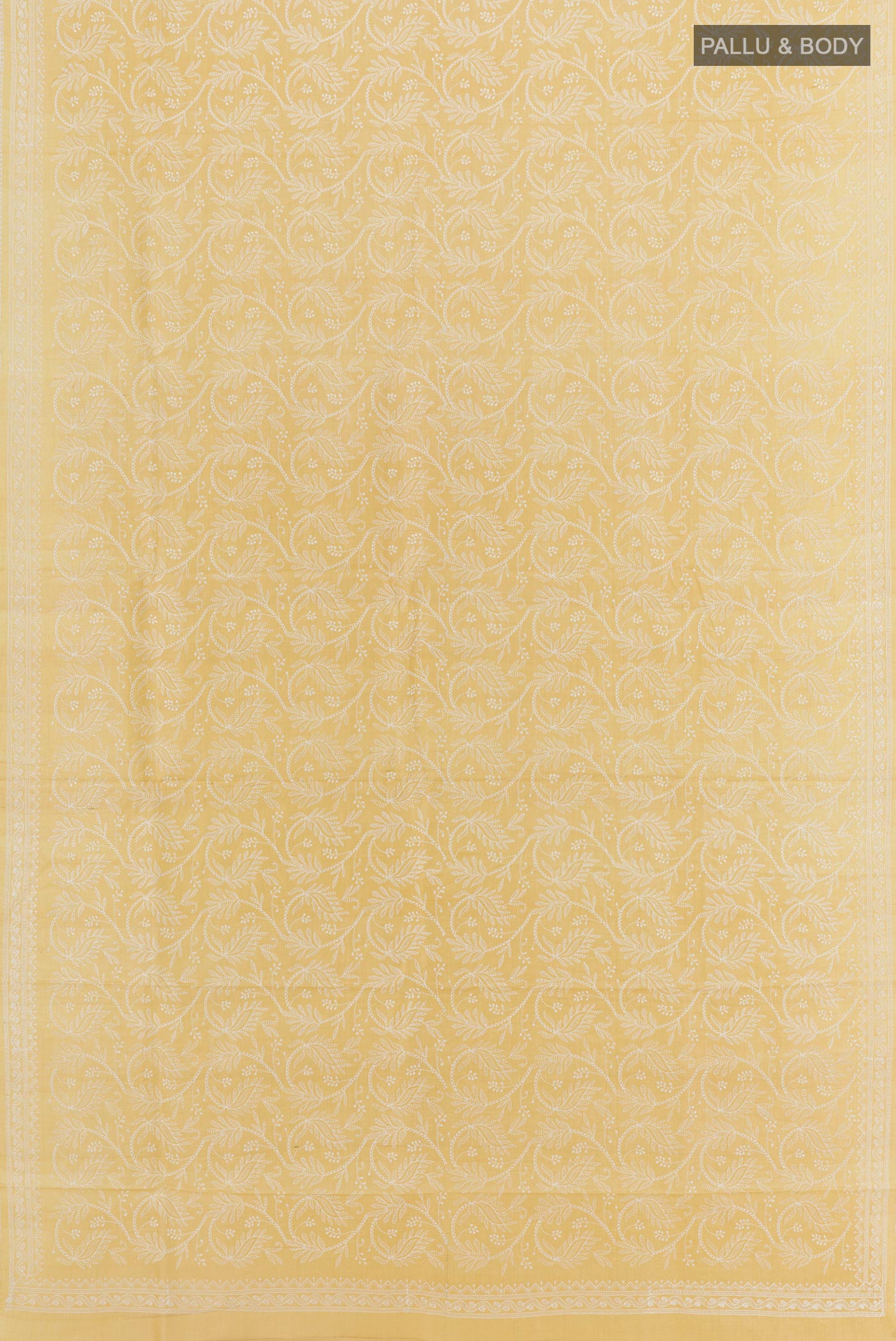 Flat view of Yellow Tussar Saree with Embroidery on the body and Embroidery Border. 