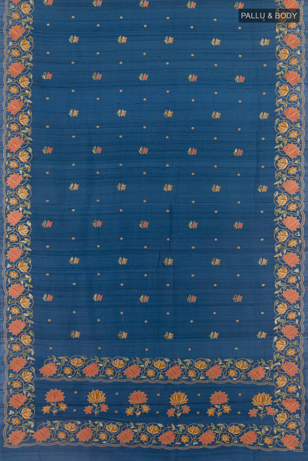 Flat view of Blue Tussar Saree with Thread Butta on the body and Zari Border. 