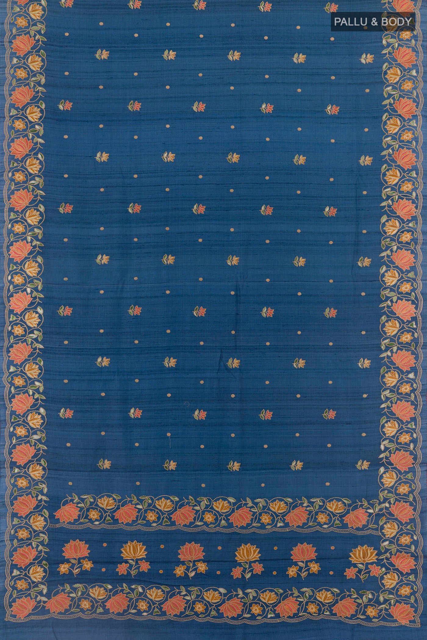 Flat view of Blue Tussar Saree with Thread Butta on the body and Zari Border. 