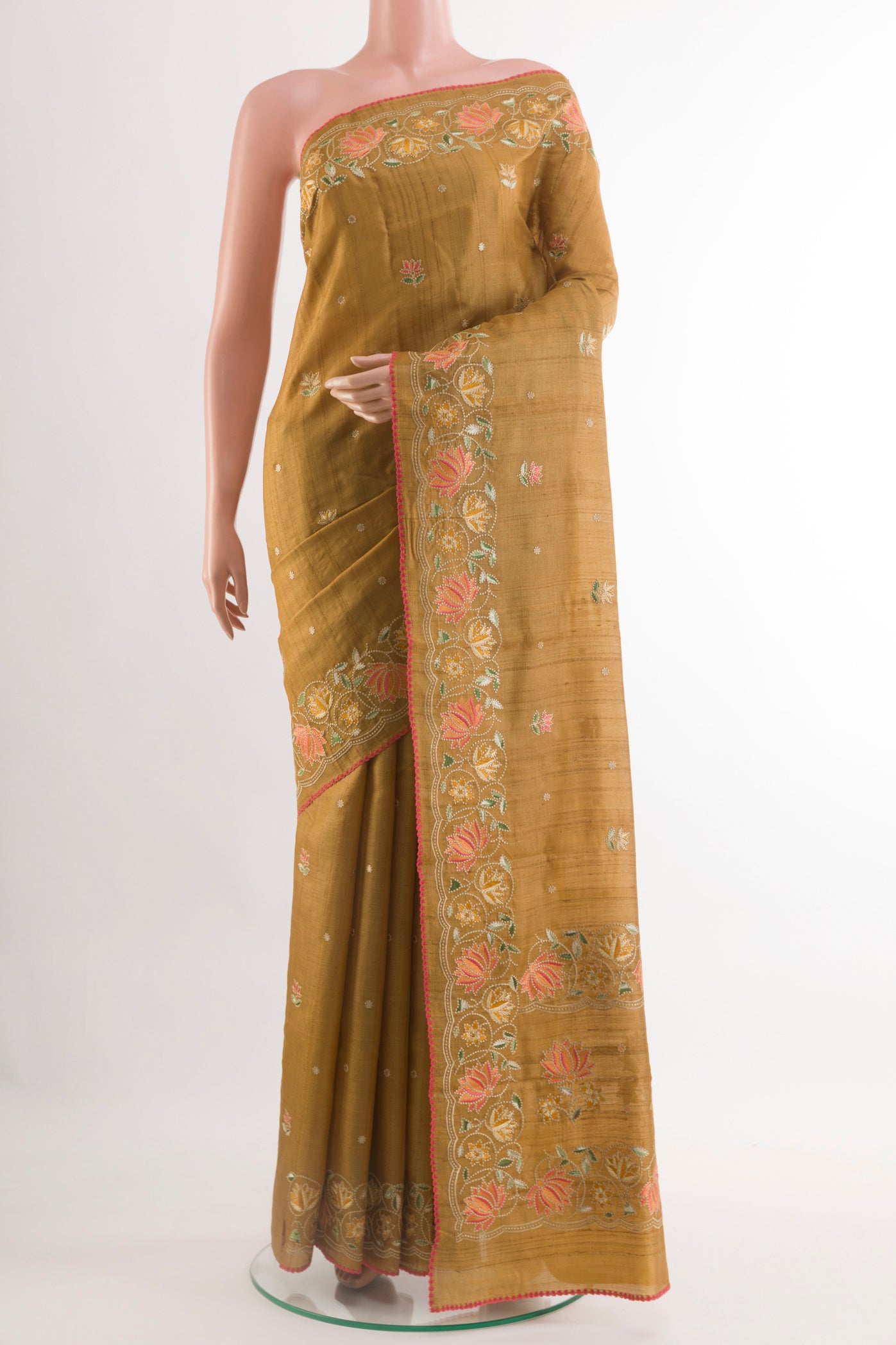 Mustard Tussar Saree with Thread Butta on the body and Zari Border.  displayed on a mannequin