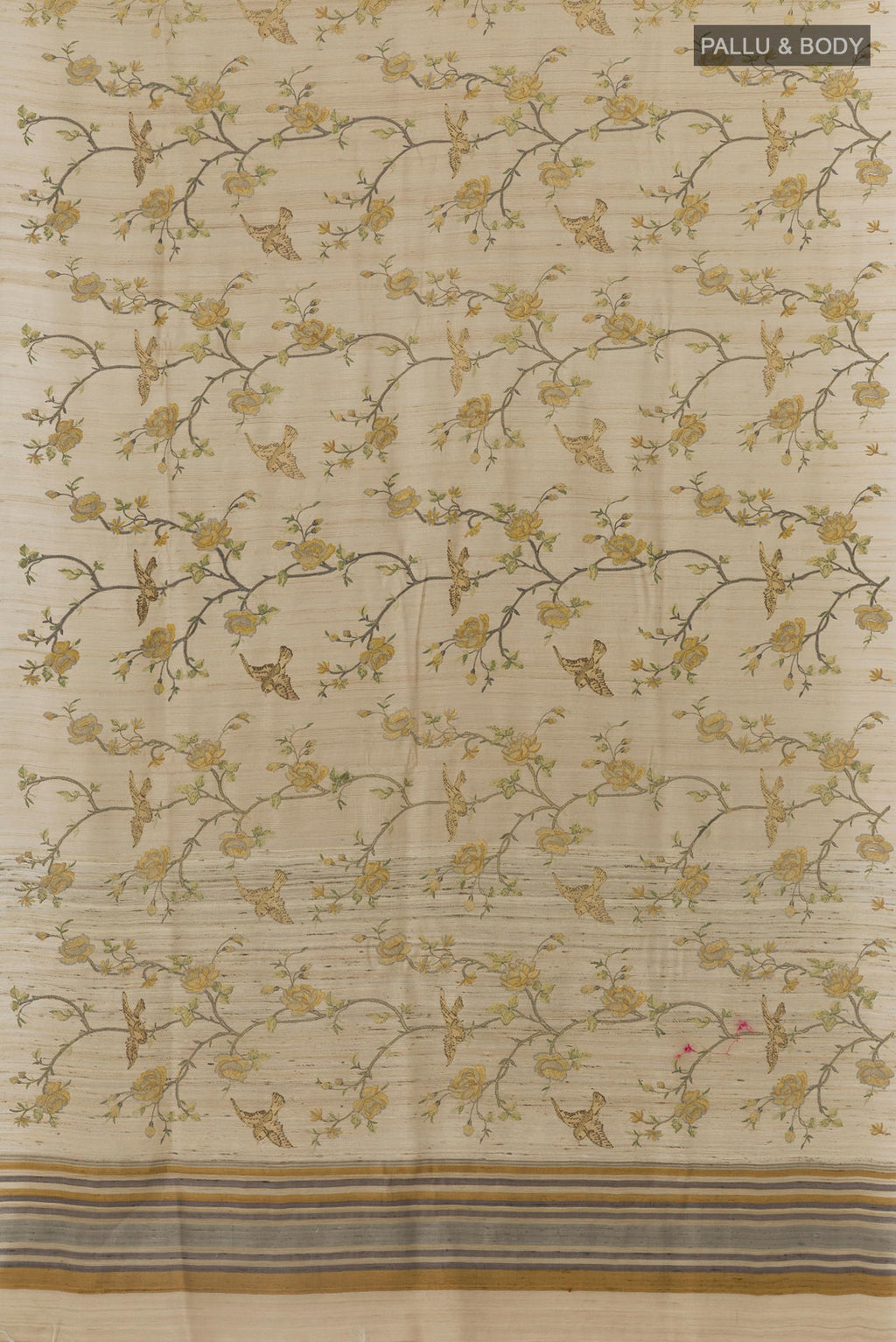 Flat view of Beige Tussar Saree with Embroidery on the body and Embroidery Border. 