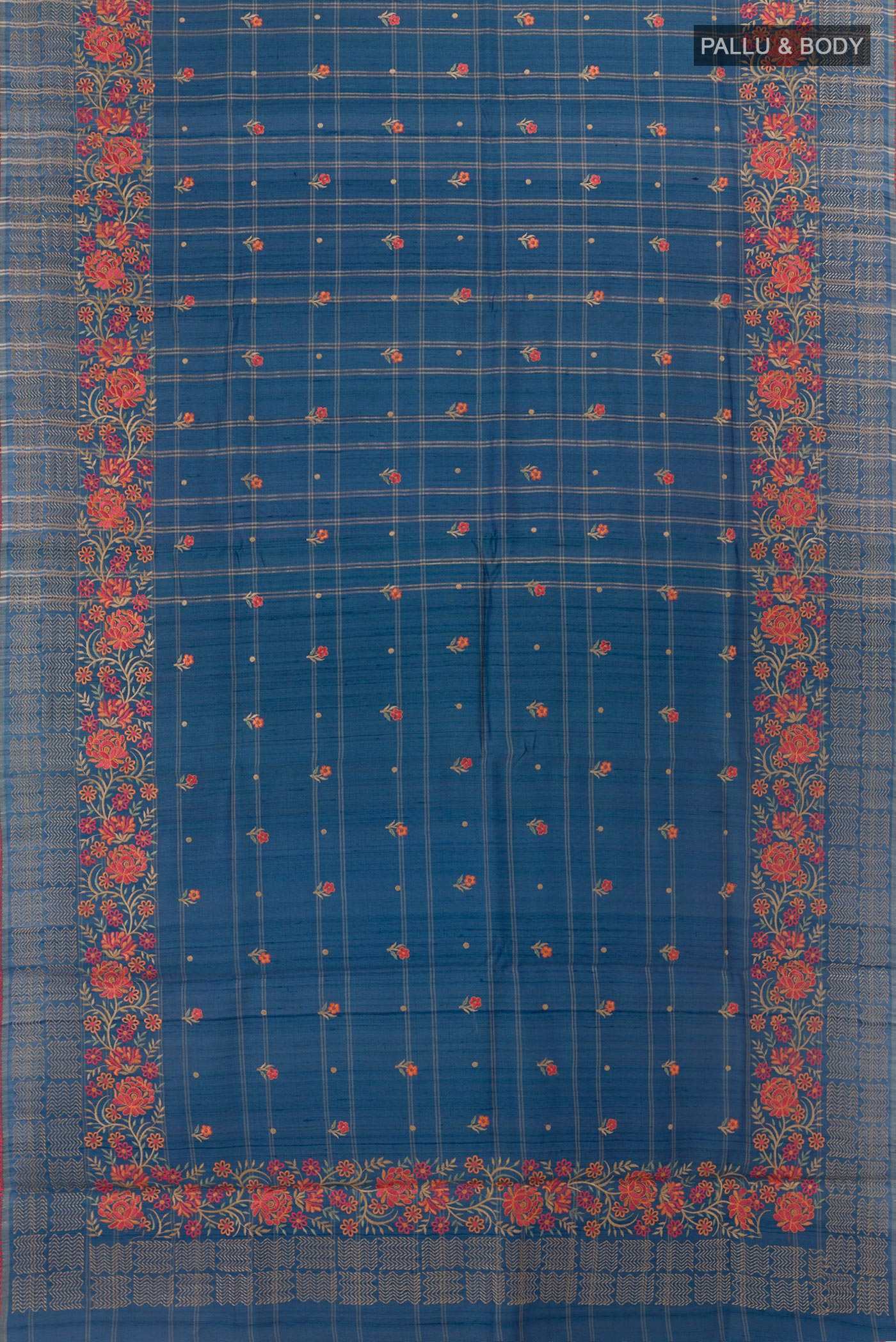 Flat view of Blue Tussar Saree with Thread Butta on the body and Embroidery Border. 