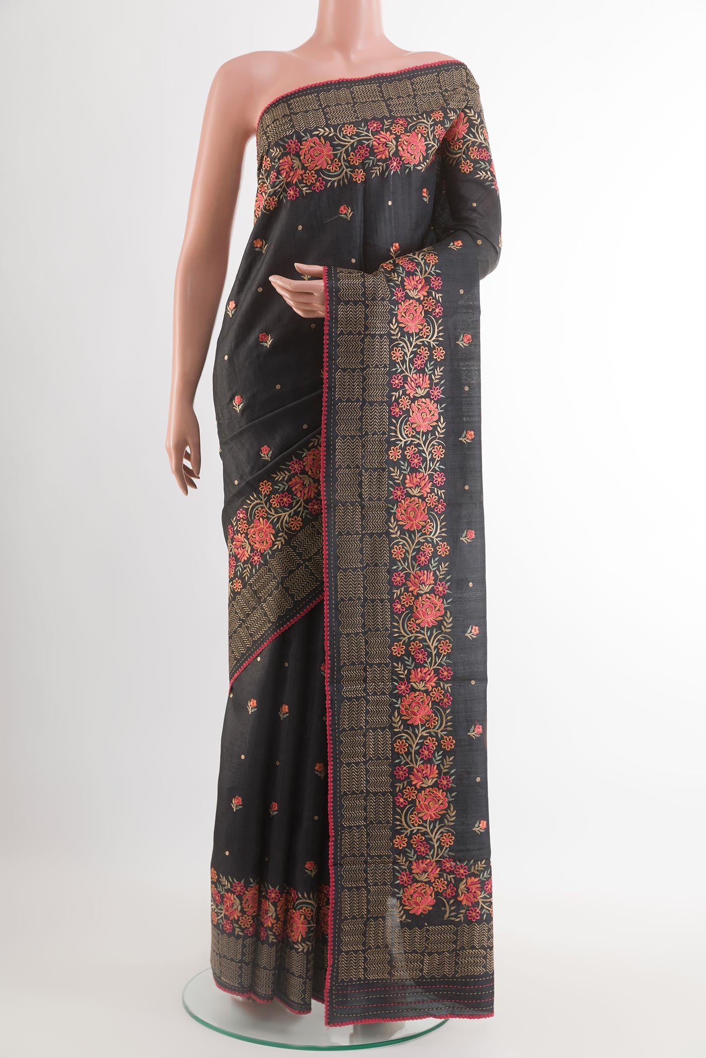 Black Tussar Saree with Thread Butta on the body and Embroidery Border.  displayed on a mannequin