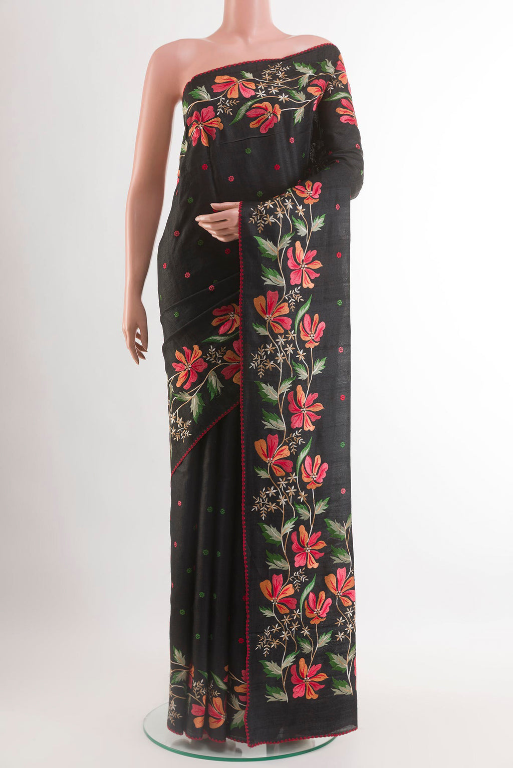 Black Tussar Saree with Embroidery on the body and Embroidery Border.  displayed on a mannequin