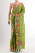 Green Tussar Saree with Embroidery on the body and Embroidery Border.  displayed on a mannequin