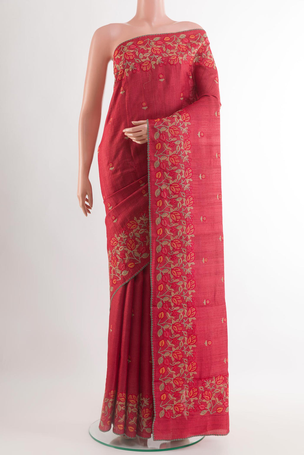 Red Tussar Saree with Thread Butta on the body and Embroidery Border.  displayed on a mannequin