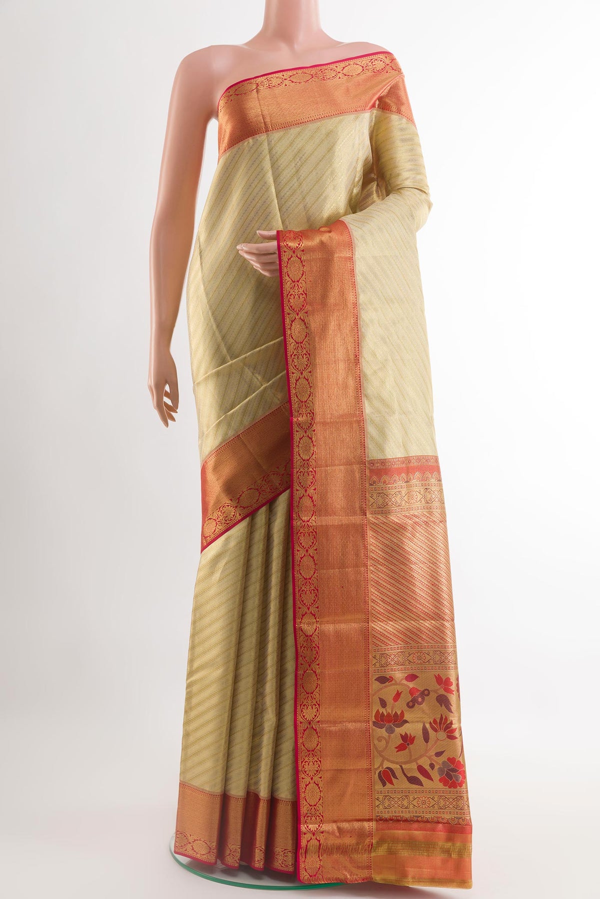 Off White Kanjivaram Silk Saree with Zari Brocade on the body and Zari Border.  displayed on a mannequin