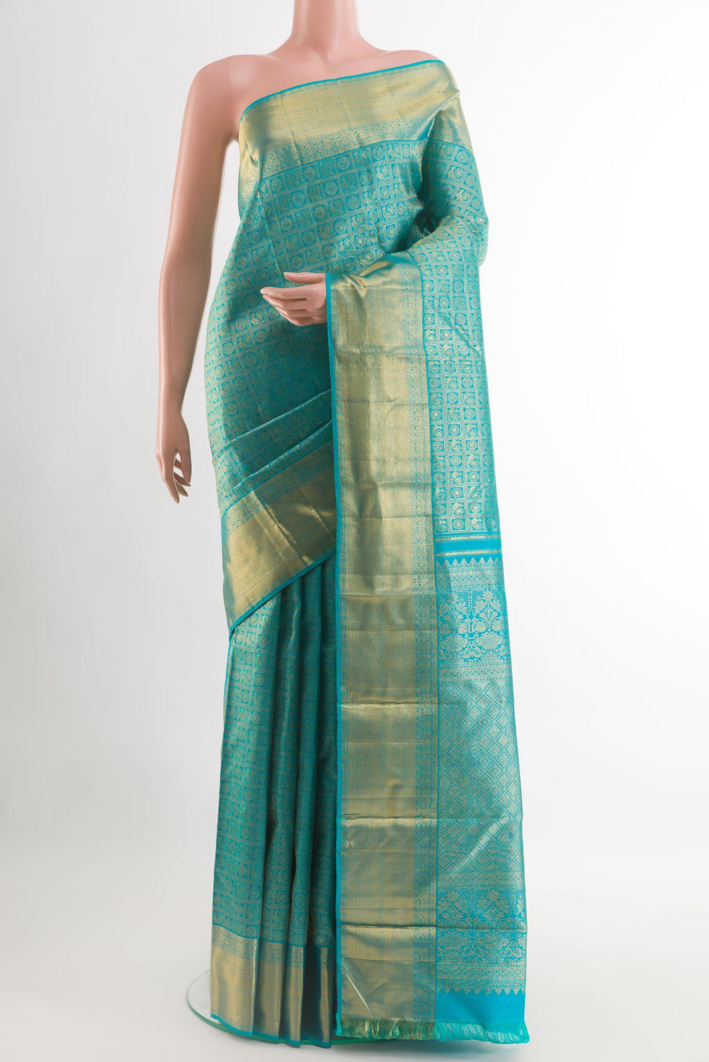 Blue Kanchipuram Silk Saree with Zari Brocade on the body and Zari Border.  displayed on a mannequin