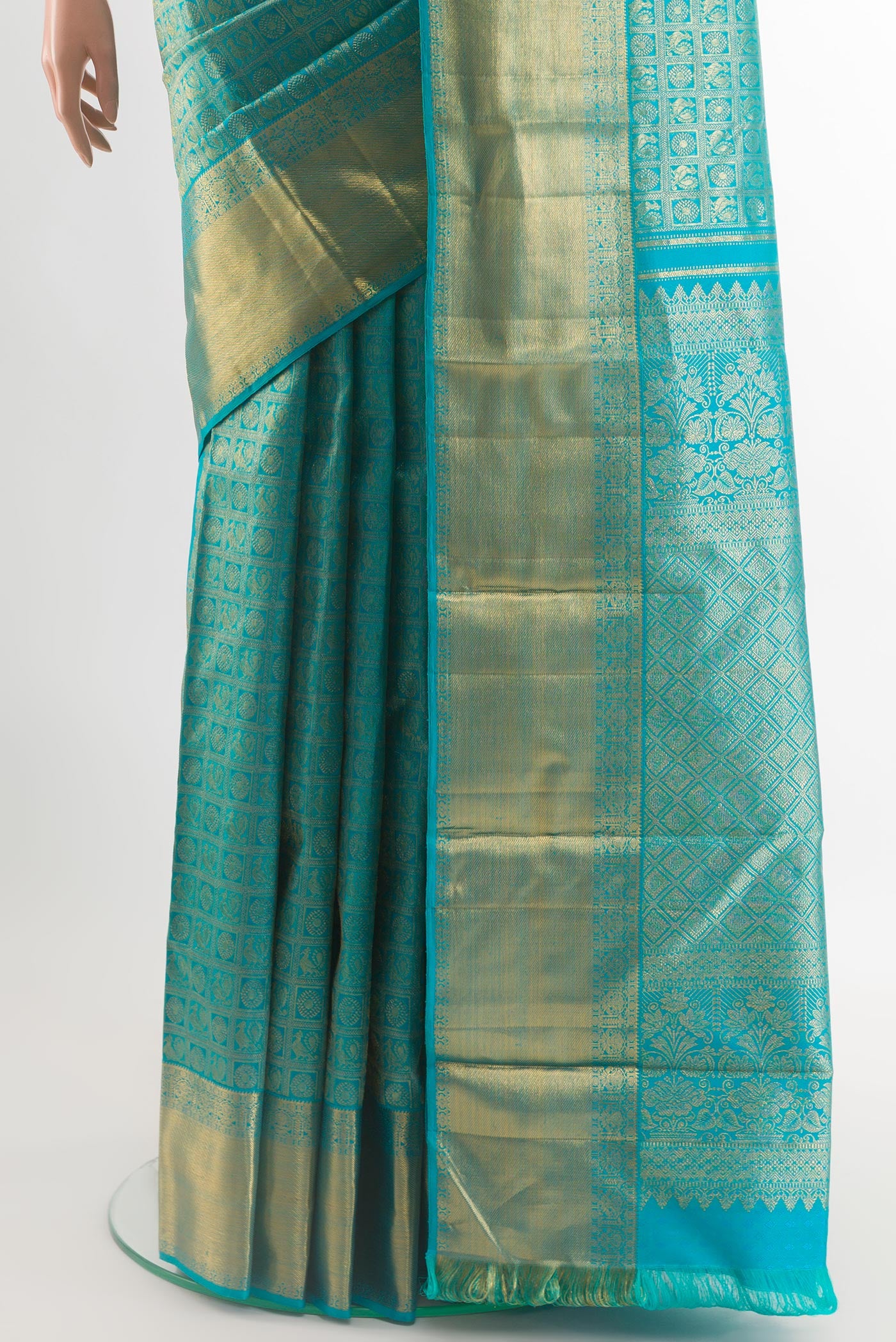 Pleats and pallu of Blue Kanchipuram Silk Saree with Zari Brocade on the body and Zari Border. 