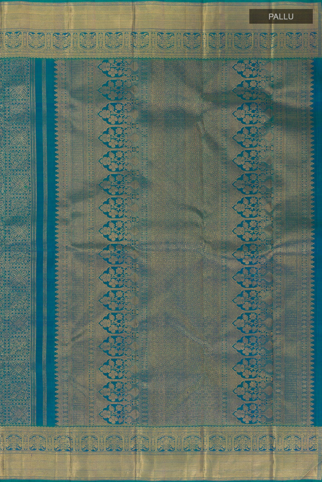 Close up image of the pallu of Peacock Blue Kanchipuram Silk Saree with Zari Brocade on the body and Zari Border. 