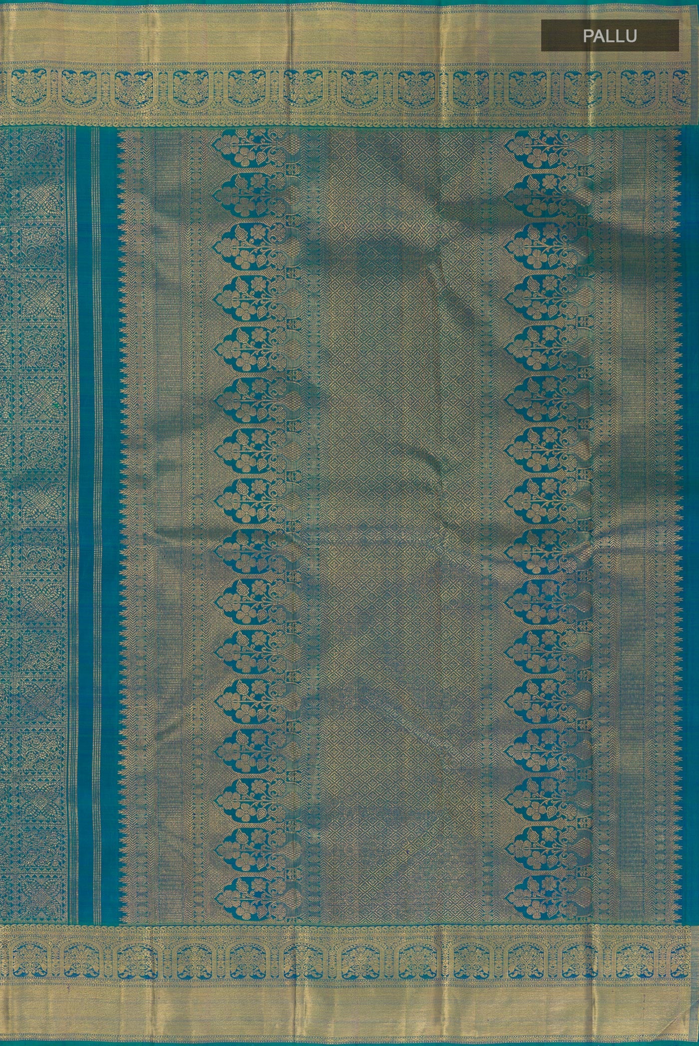 Close up image of the pallu of Peacock Blue Kanchipuram Silk Saree with Zari Brocade on the body and Zari Border. 