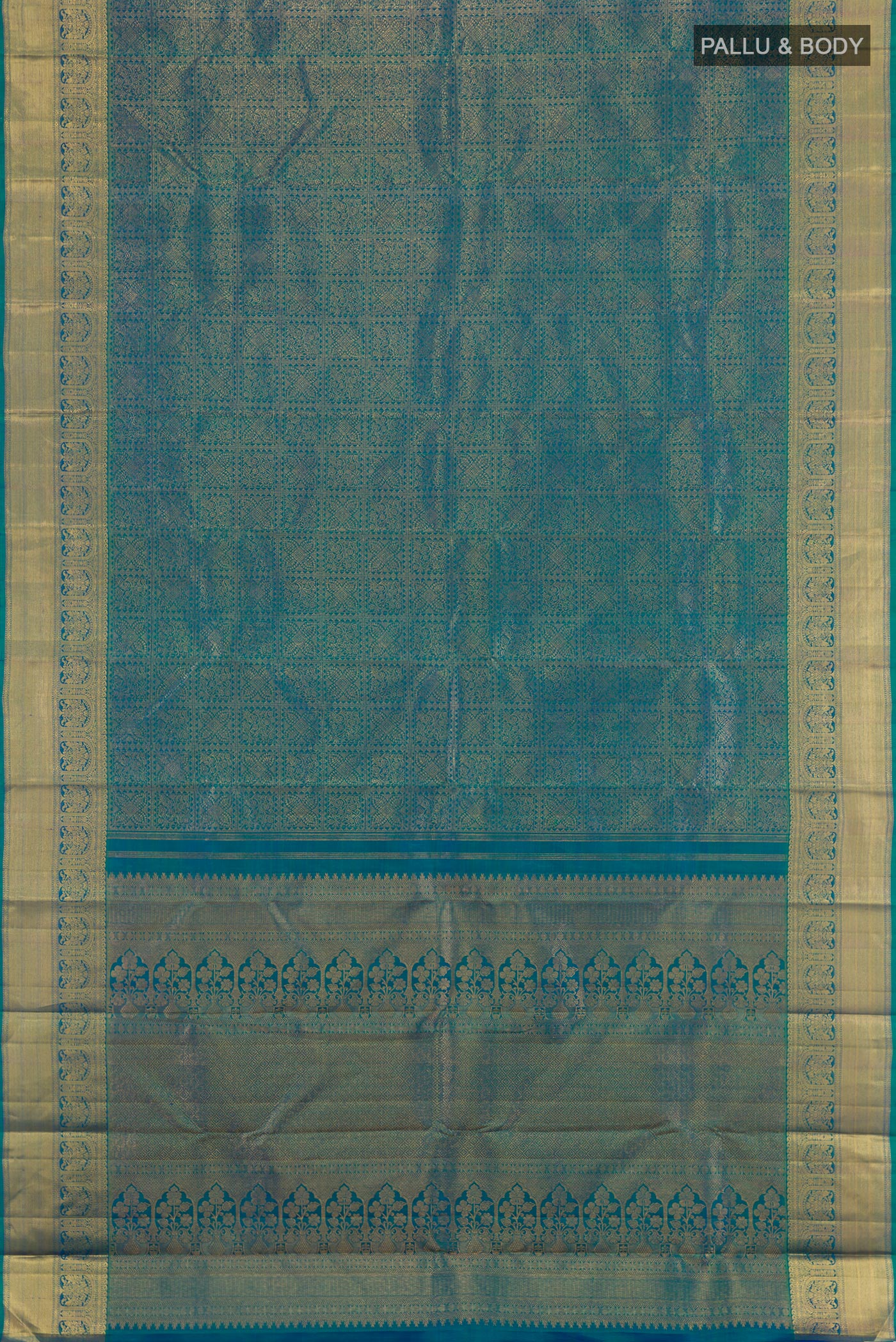 Flat view of Peacock Blue Kanchipuram Silk Saree with Zari Brocade on the body and Zari Border. 