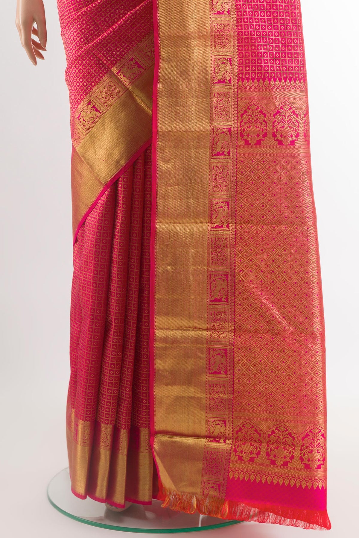 Pleats and pallu of Pink Kanchipuram Silk Saree with Zari Brocade on the body and Zari Border. 