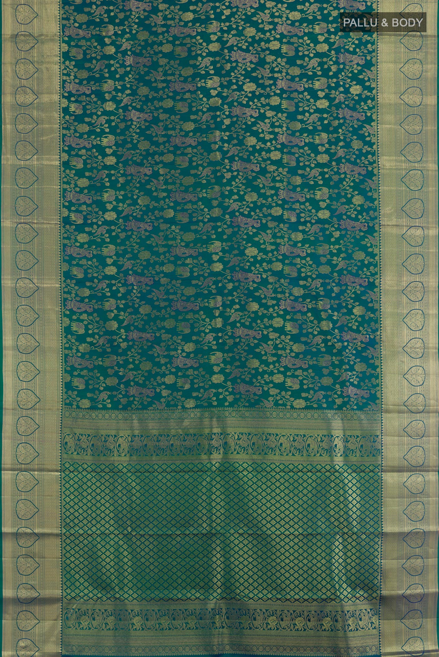 Flat view of Peacock Blue Kanchipuram Silk Saree with Zari Brocade on the body and Zari Border. 