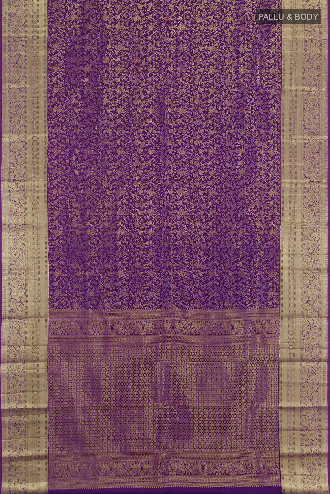 Flat view of Purple Kanchipuram Silk Saree with Zari Brocade on the body and Zari Border. 