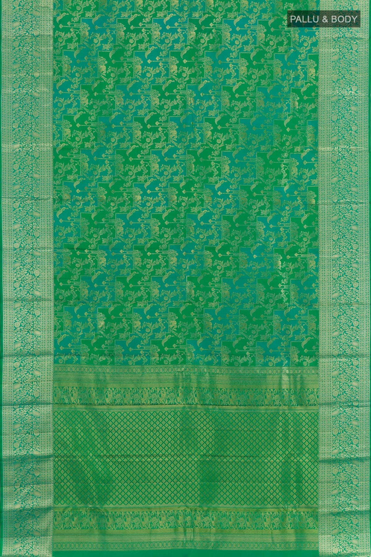 Flat view of Green Kanchipuram Silk Saree with Zari Brocade on the body and Zari Border. 
