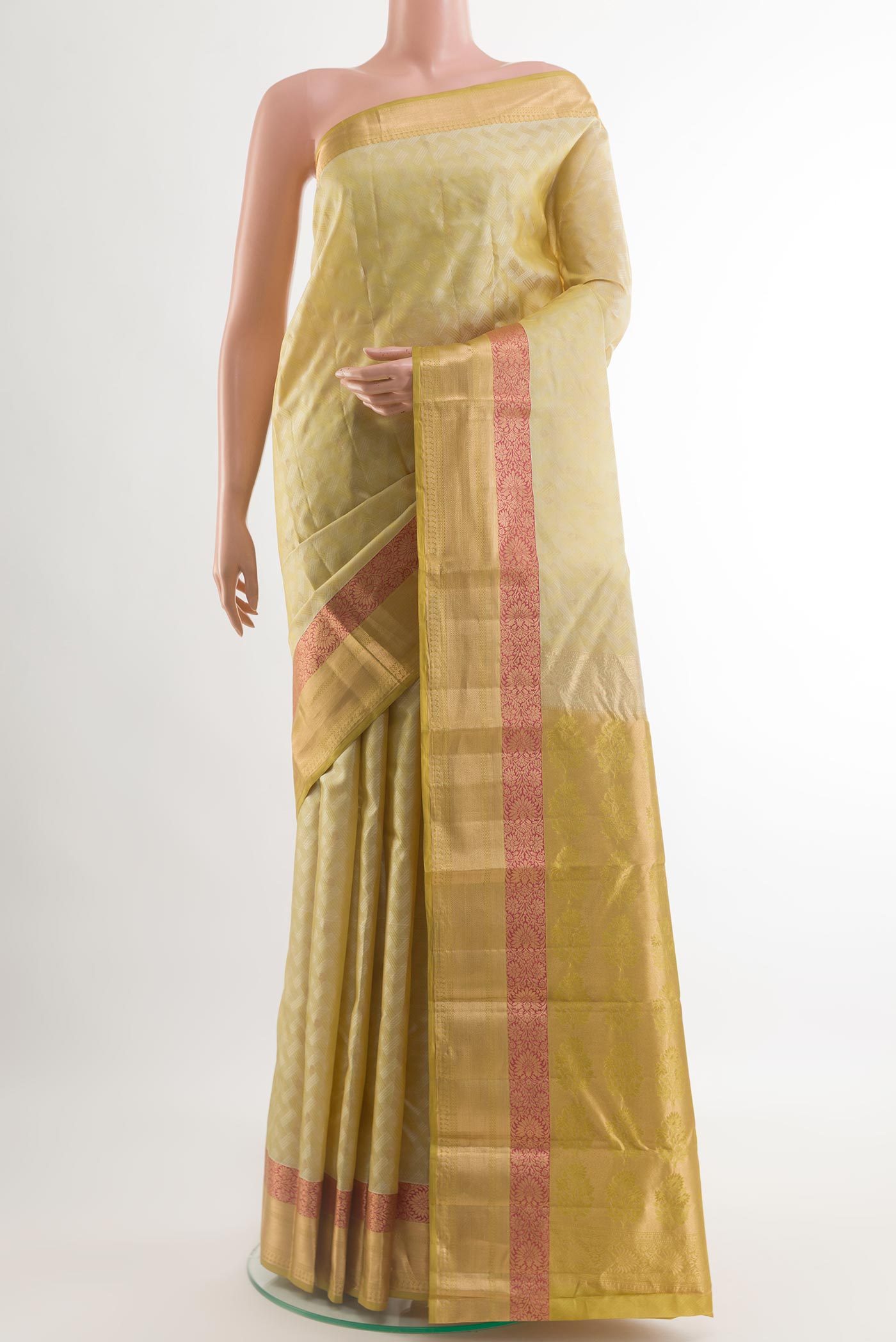 Cream Kanjivaram Silk Saree with Jacquard With Zari Butta on the body and Zari Border.  displayed on a mannequin