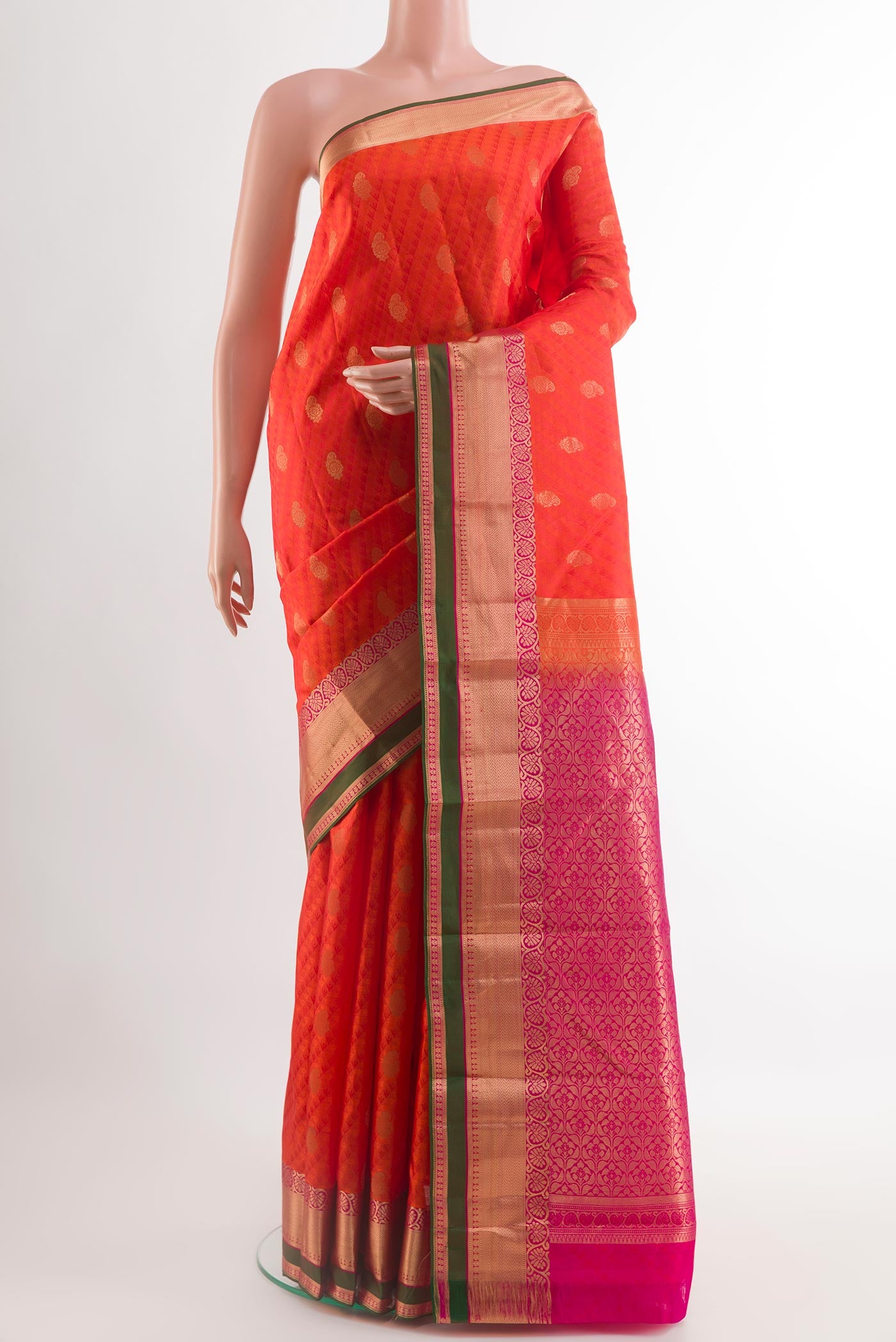 Orange Kanjivaram Silk Saree with Jacquard With Zari Butta on the body and Zari Border.  displayed on a mannequin