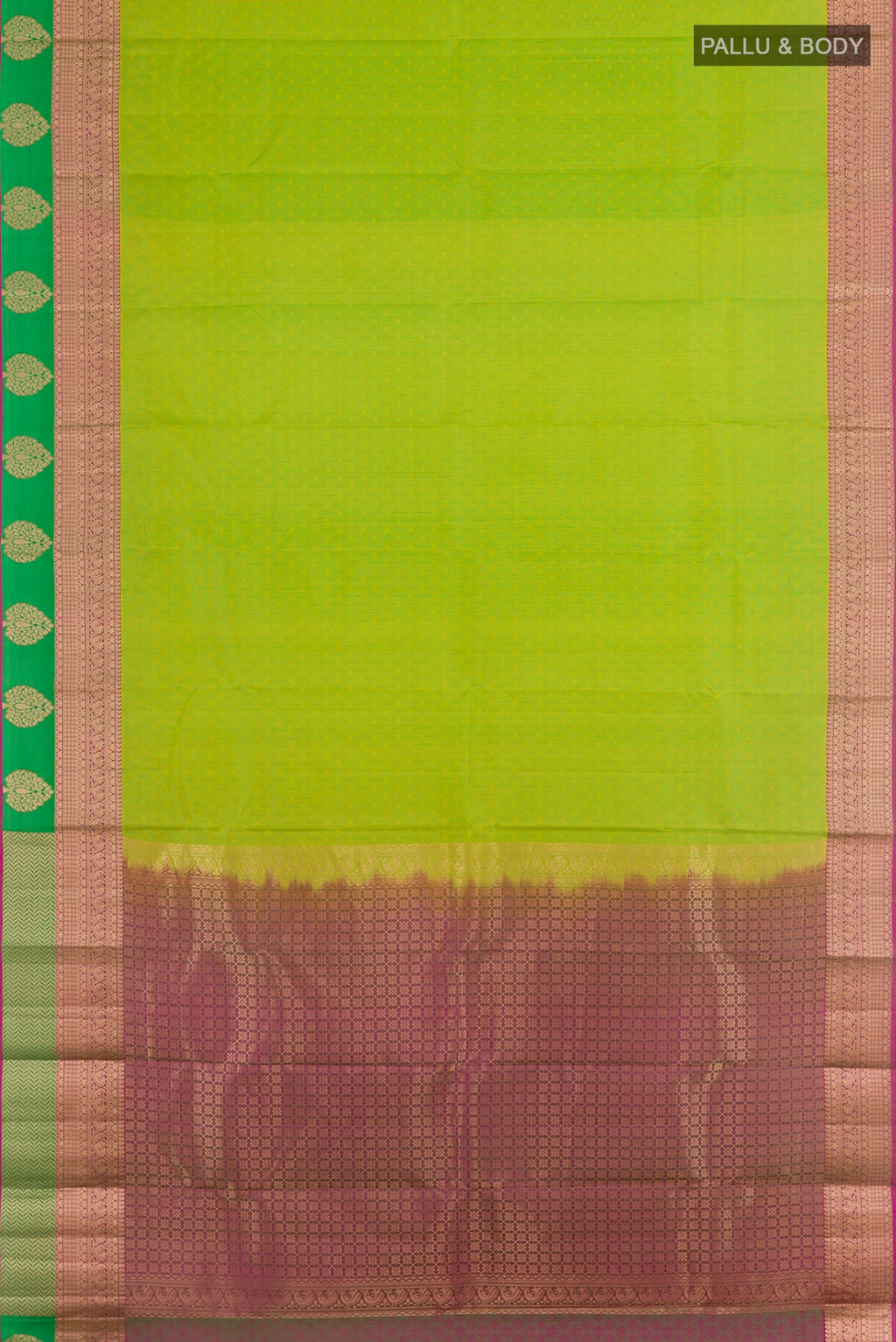 Flat view of Green Kanjivaram Silk Saree with Jacquard design on the body and Zari Border. 