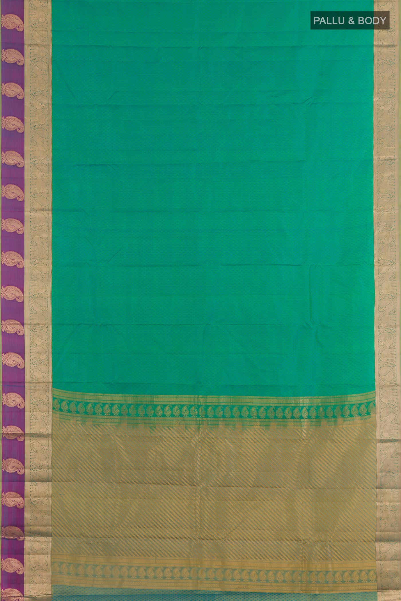 Flat view of Green Kanjivaram Silk Saree with Jacquard design on the body and Zari Border. 