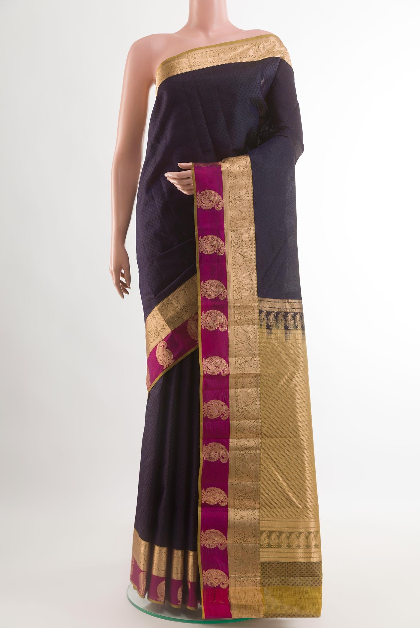 Dark Blue Kanjivaram Silk Saree with Jacquard design on the body and Zari Border.  displayed on a mannequin