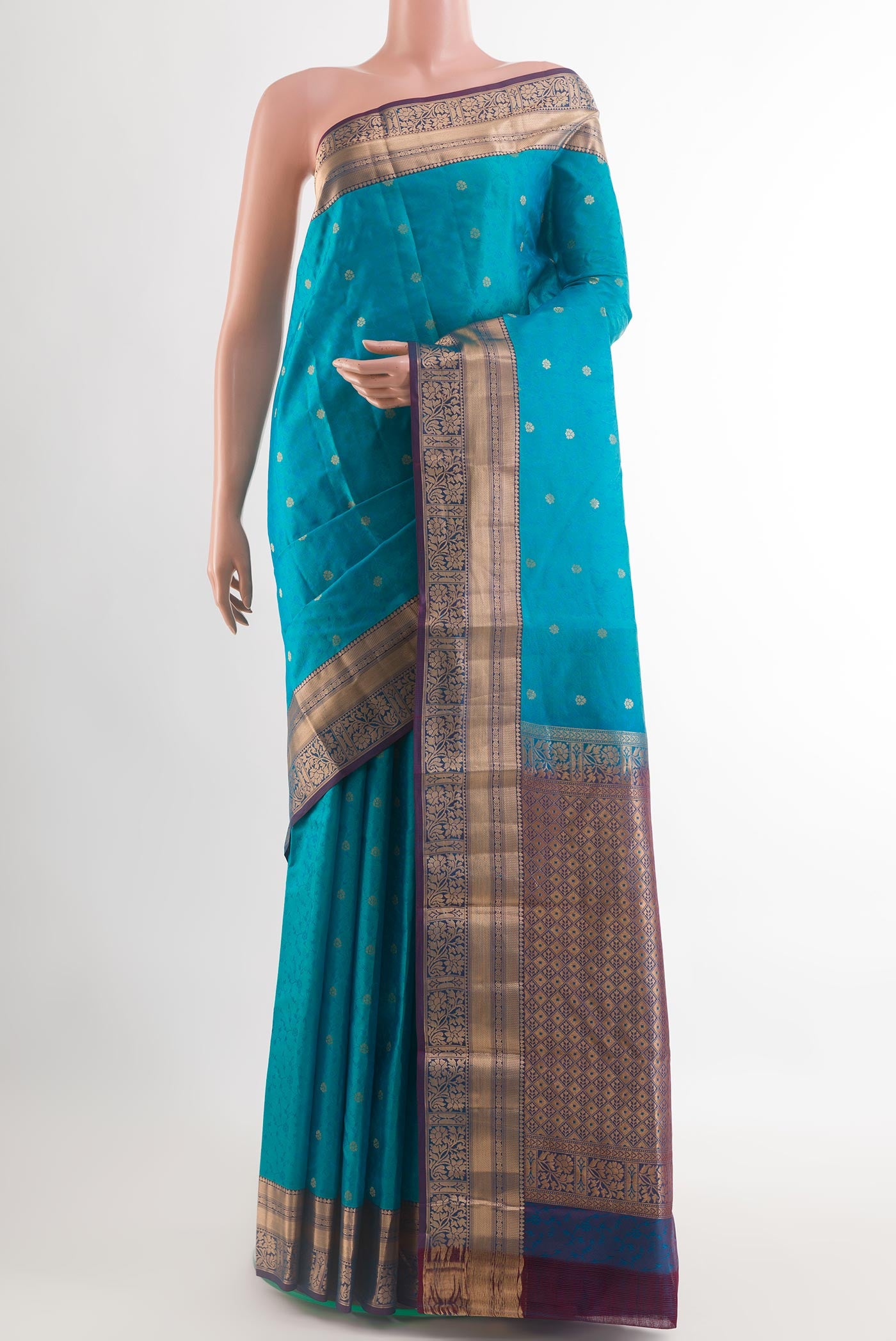 Blue Kanjivaram Silk Saree with Jacquard With Zari Butta on the body and Zari Border.  displayed on a mannequin