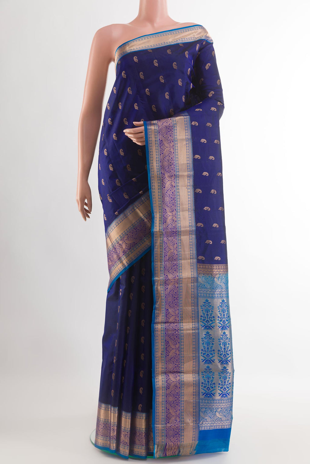 Dark Blue Kanjivaram Silk Saree with Zari Butta on the body and Zari Border.  displayed on a mannequin