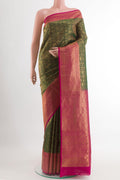 Green Kanchipuram Silk Saree with Zari Brocade on the body and Zari Border.  displayed on a mannequin
