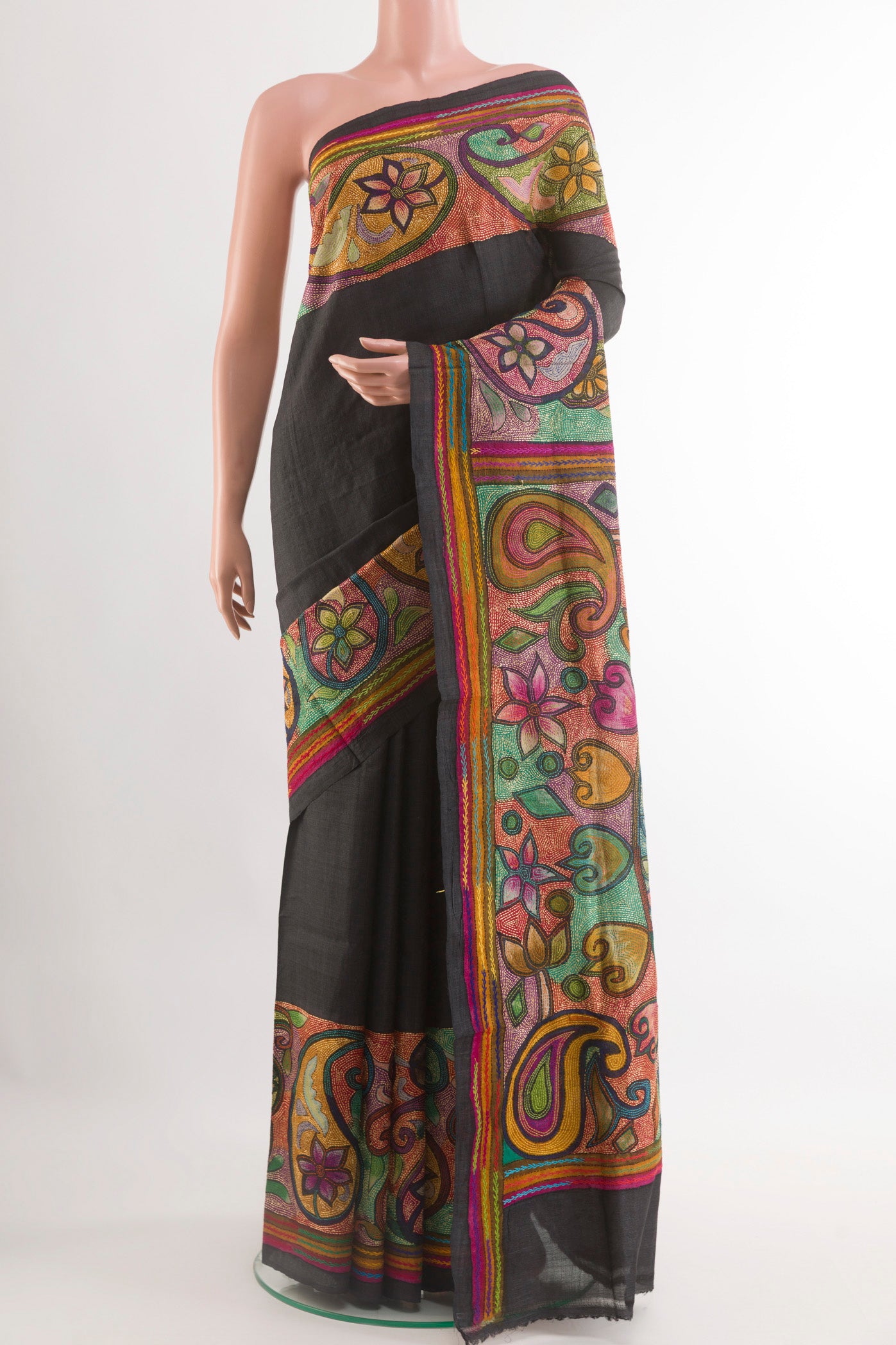 Black Tussar Saree with Plain Body and Embroidery Border.  displayed on a mannequin