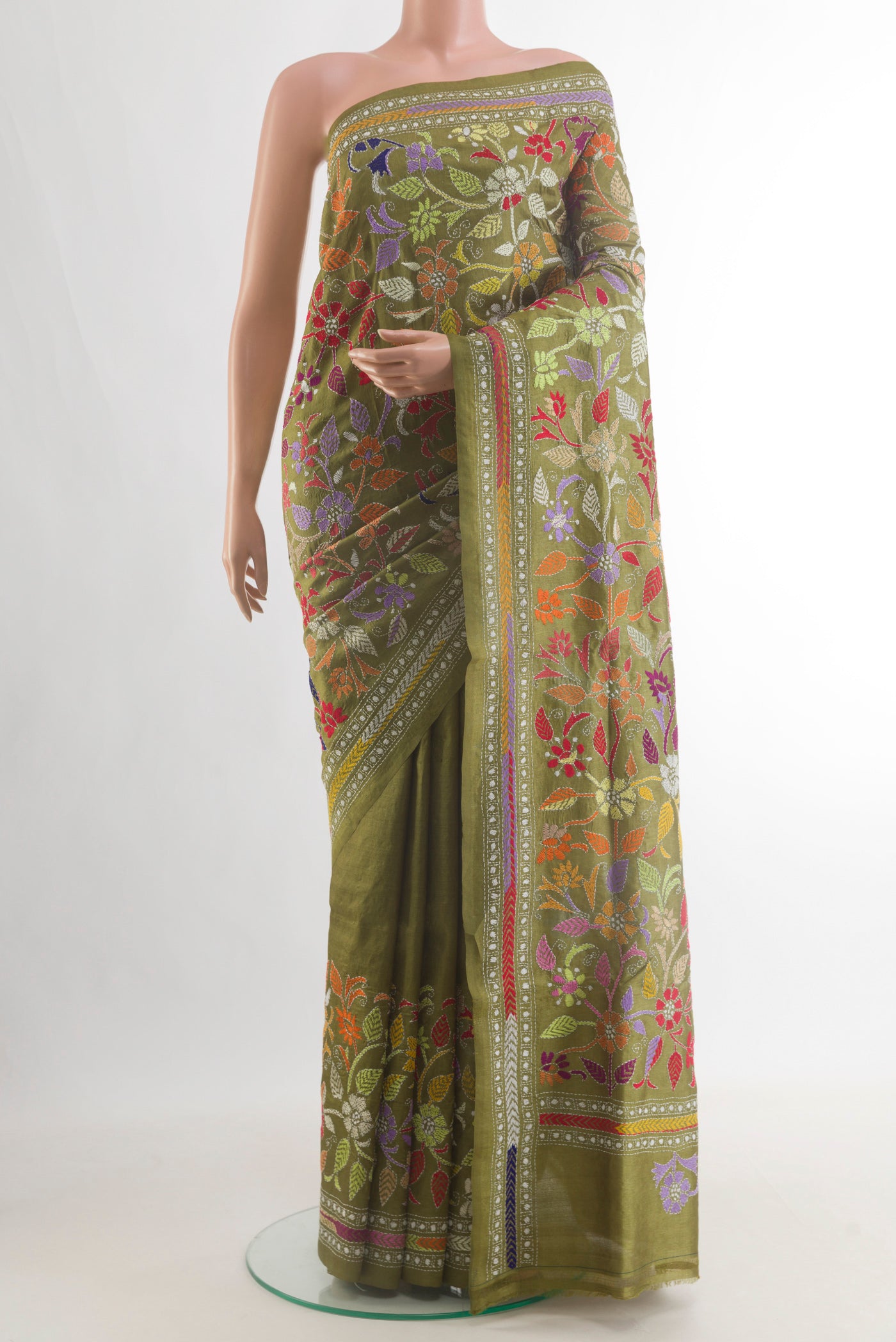Olive Green Tussar Saree with Kantha Work on the body and Embroidery Border.  displayed on a mannequin