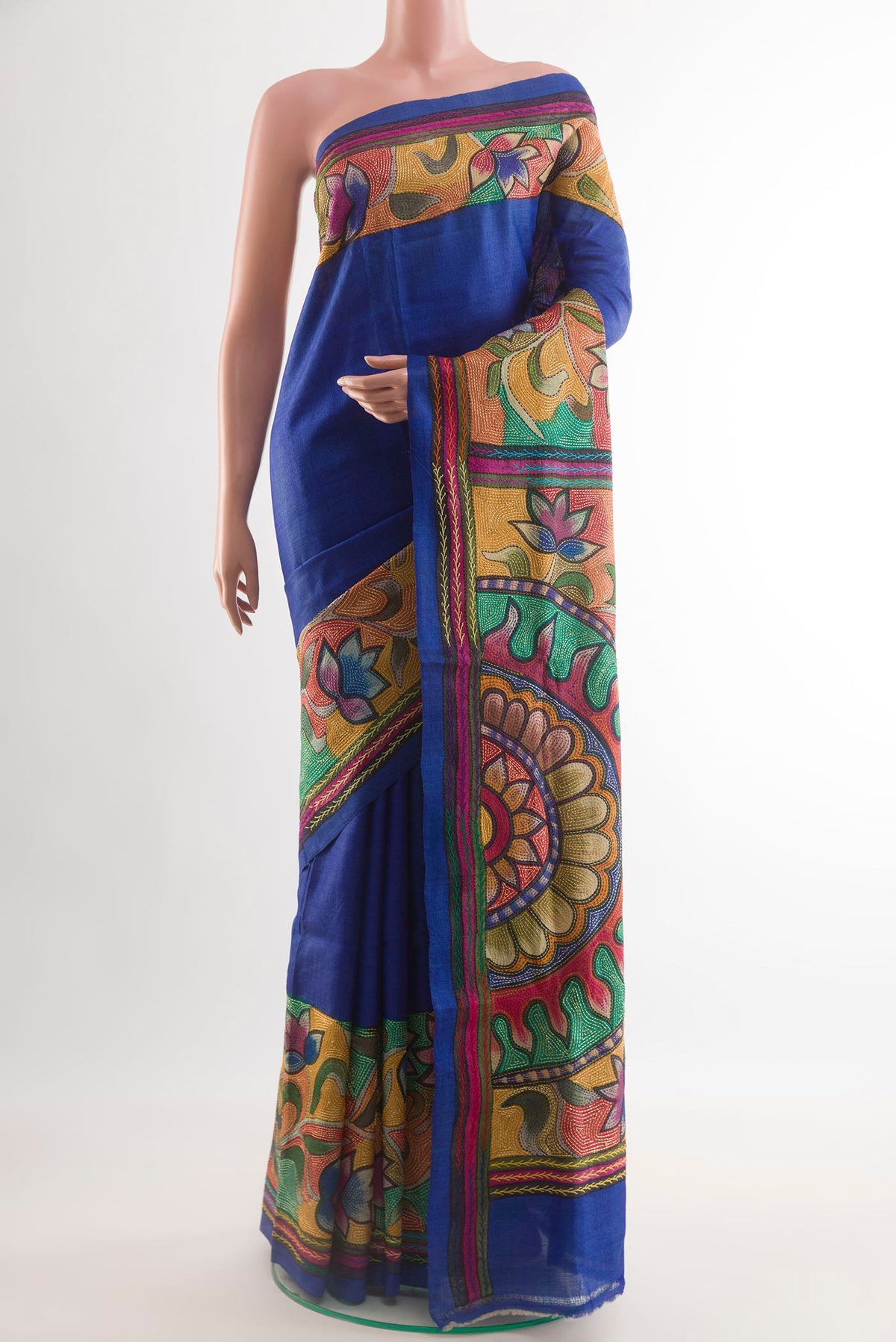 Blue Tussar Saree with Plain Body and Embroidery Border.  displayed on a mannequin