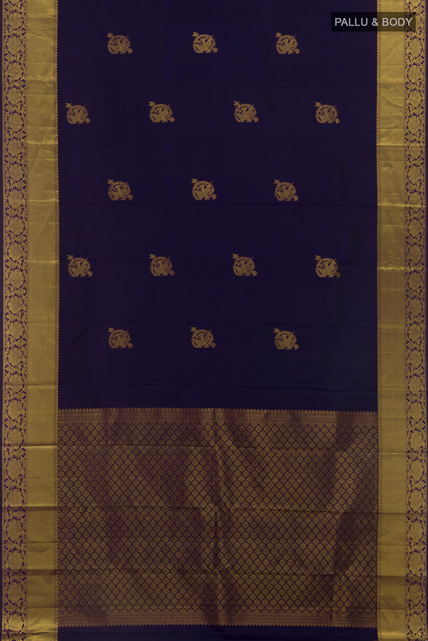 Flat view of Navy Blue Kanchipuram Silk Saree with Zari Butta on the body and Zari Border. 