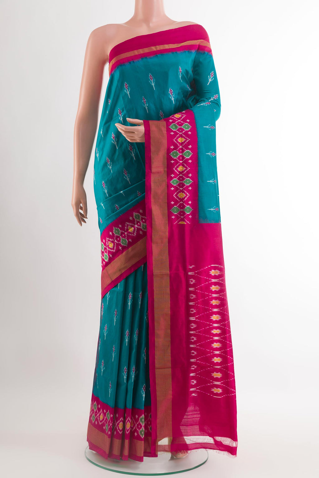 Blue Pochampally Silk Saree with Pure Ikat on the body and Zari Border.  displayed on a mannequin
