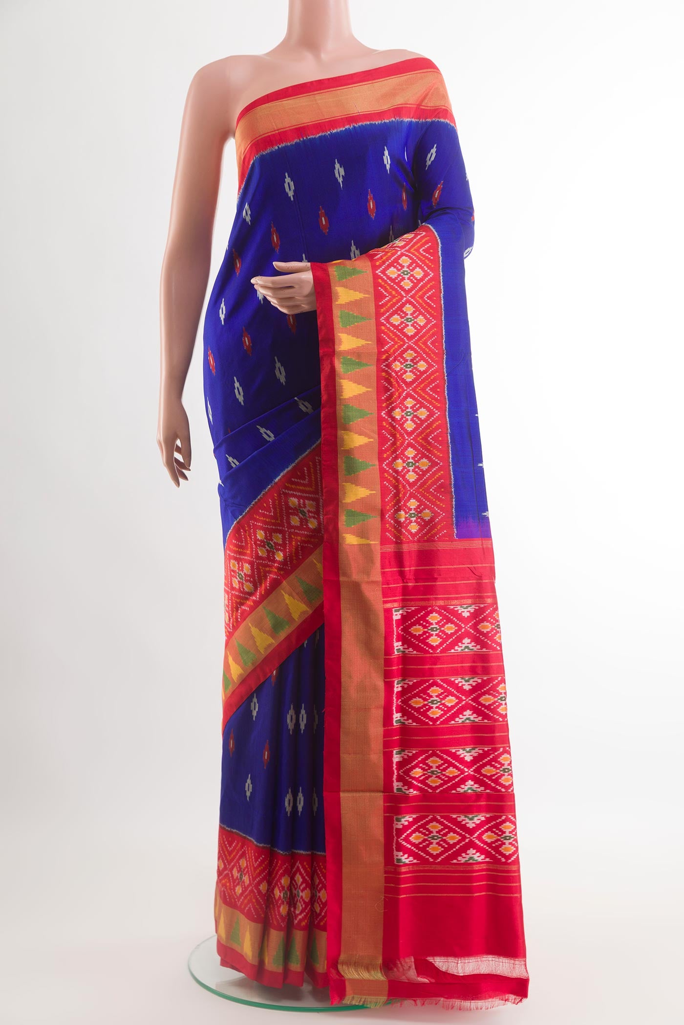 Blue Pochampally Silk Saree with Pure Ikat on the body and Zari Border.  displayed on a mannequin