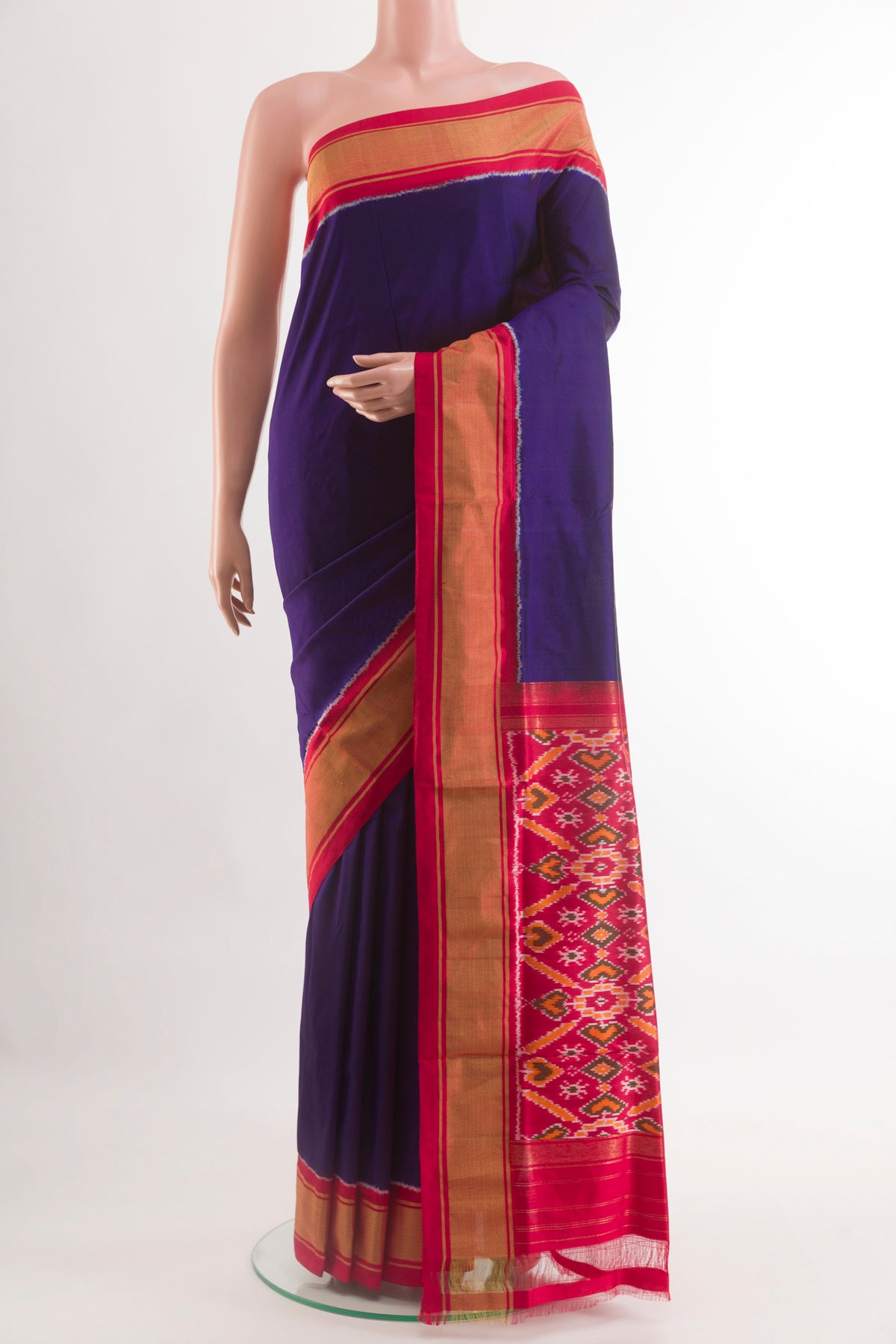 Purple Pochampally Silk Saree with Plain Body and Zari Border.  displayed on a mannequin