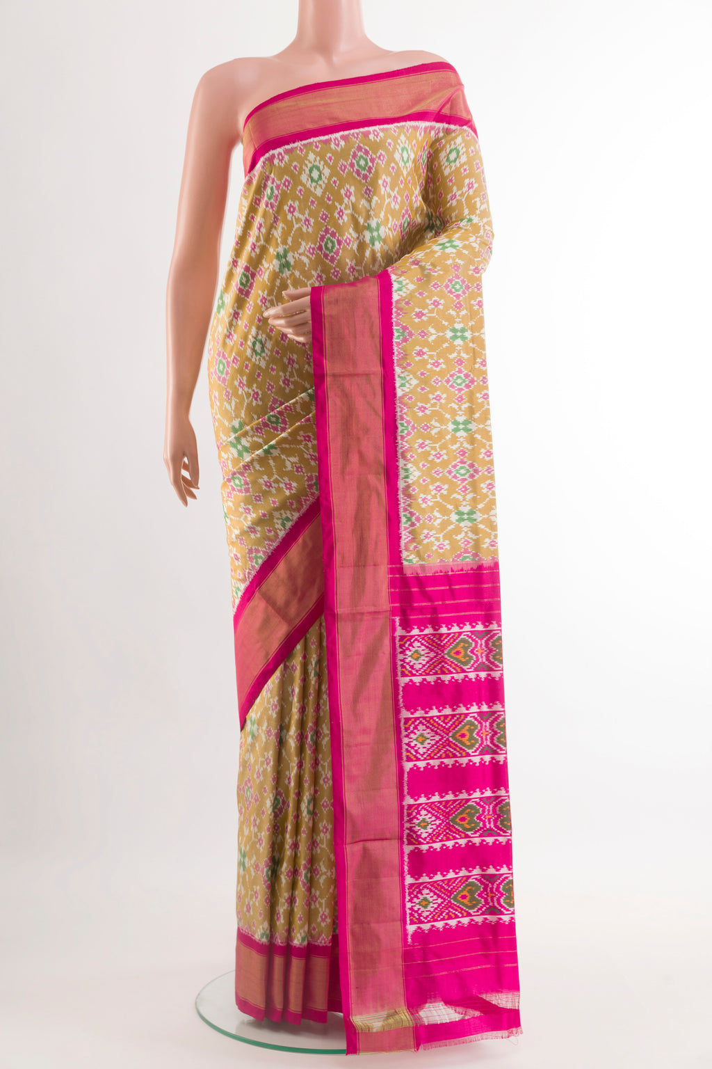 Beige Pochampally Silk Saree with Pure Ikat on the body and Zari Border.  displayed on a mannequin
