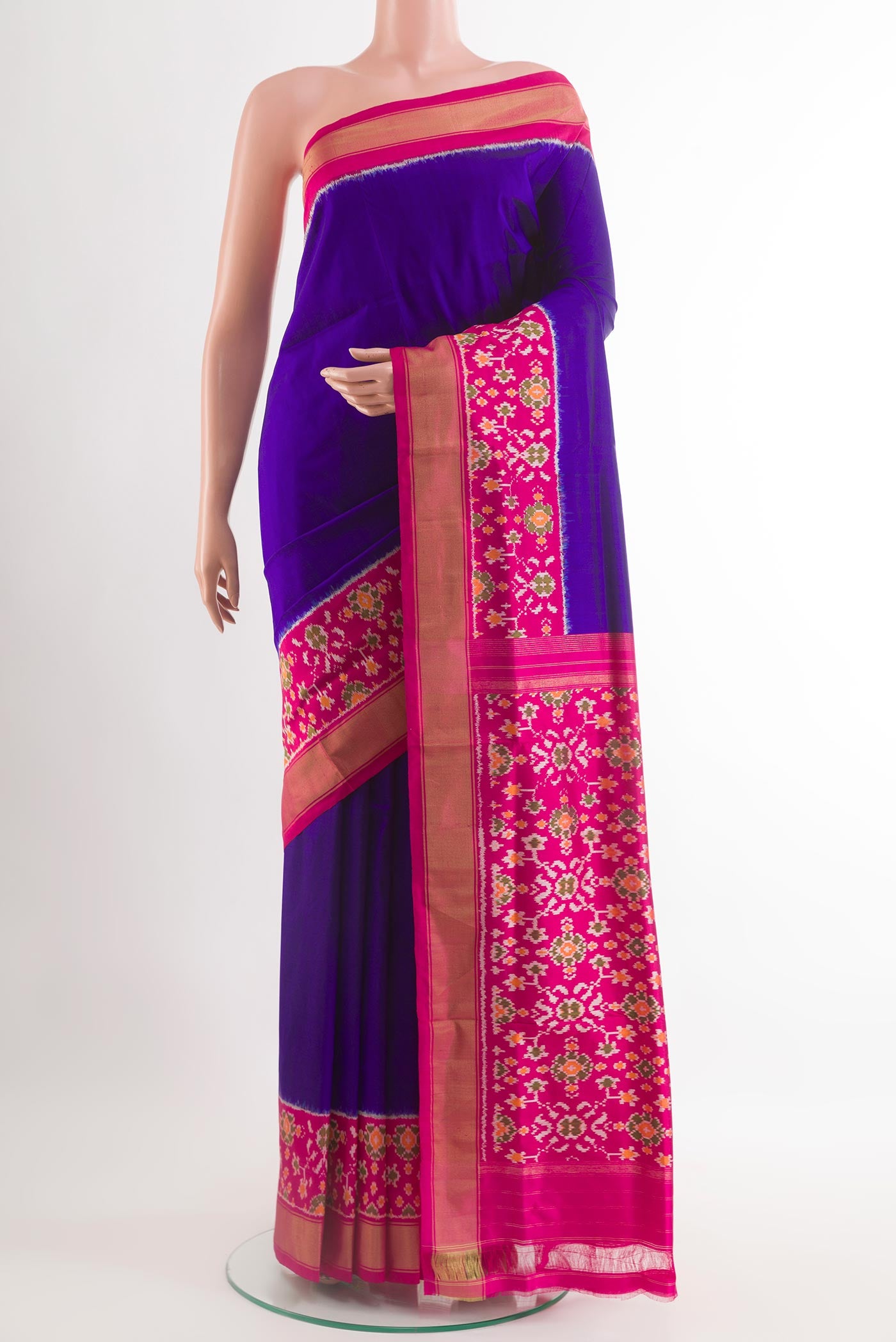 Blue Pochampally Silk Saree with Plain Body and Zari Border.  displayed on a mannequin