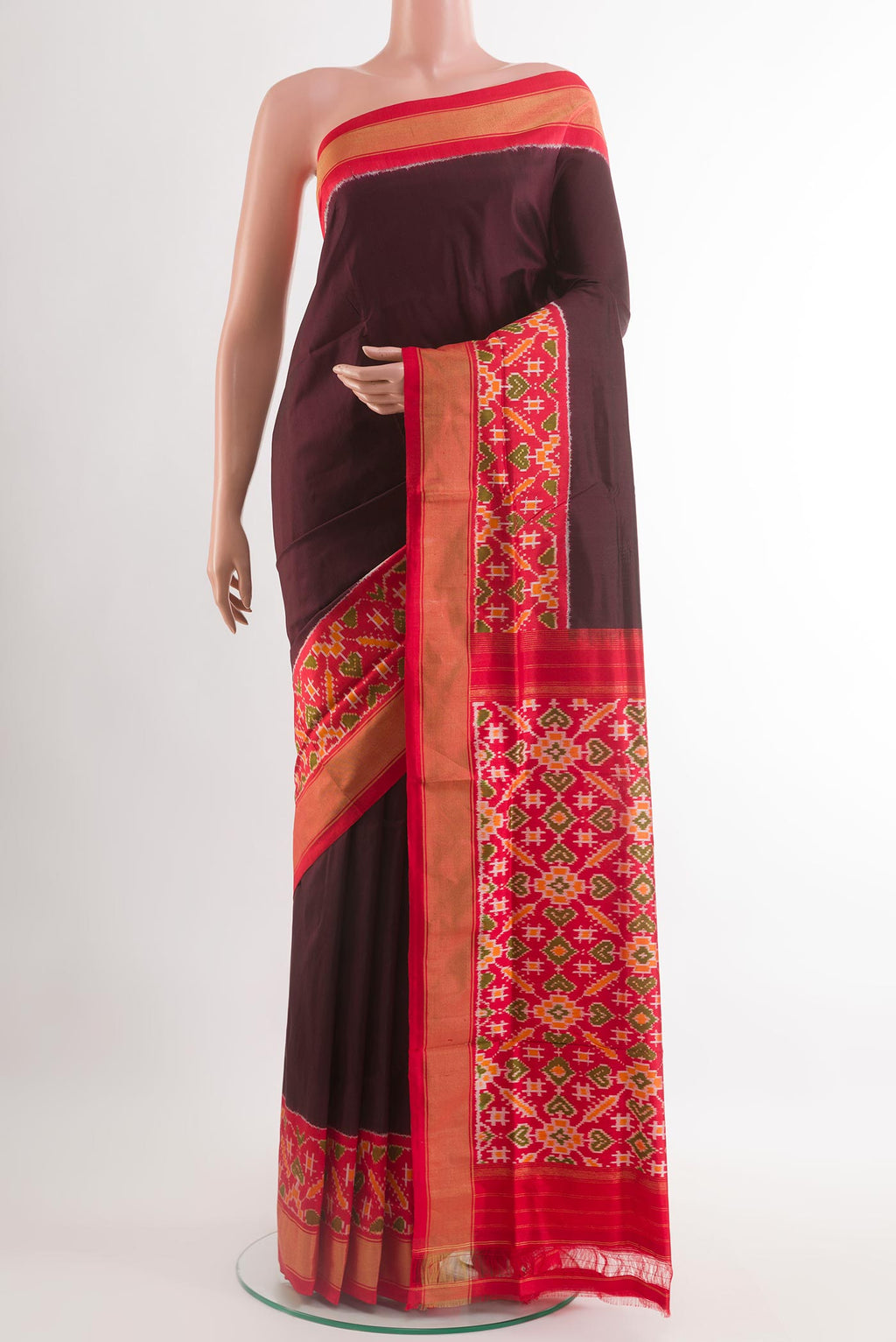 Brown Pochampally Silk Saree with Plain Body and Zari Border.  displayed on a mannequin