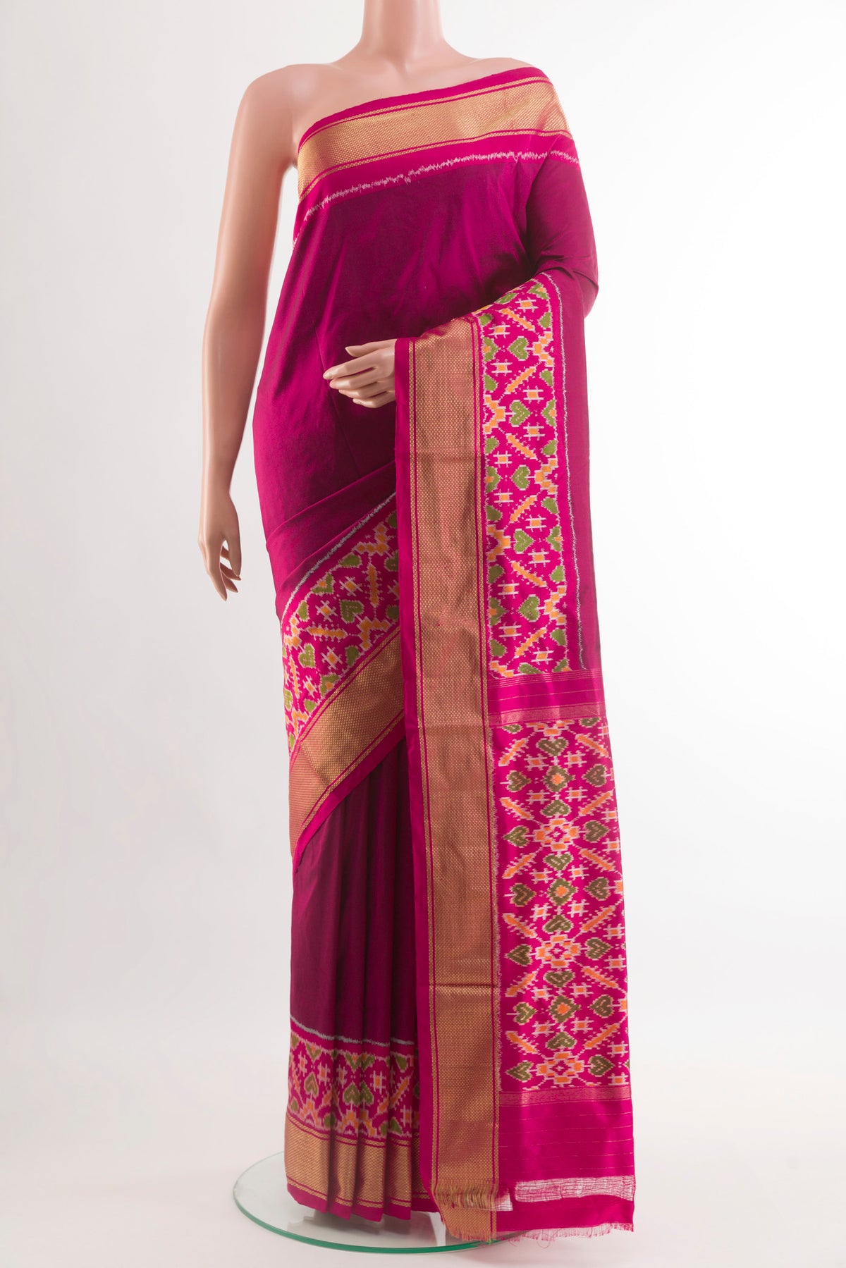 Purple Pochampally Silk Saree with Plain Body and Zari Border.  displayed on a mannequin
