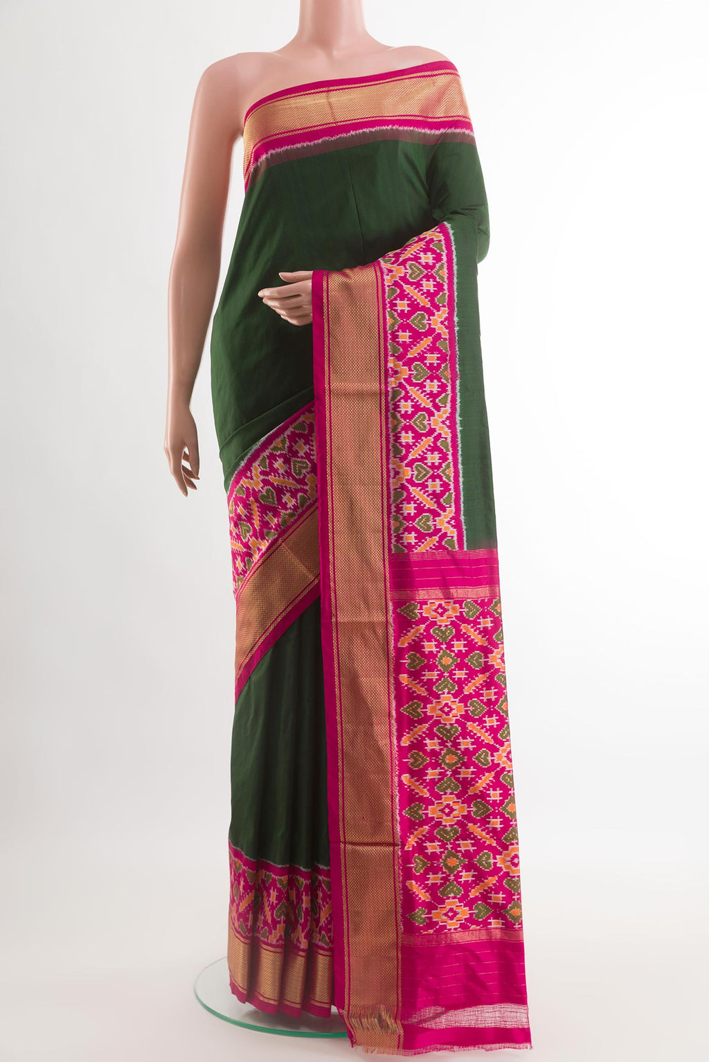 Bottle Green Pochampally Silk Saree with Plain Body and Zari Border.  displayed on a mannequin