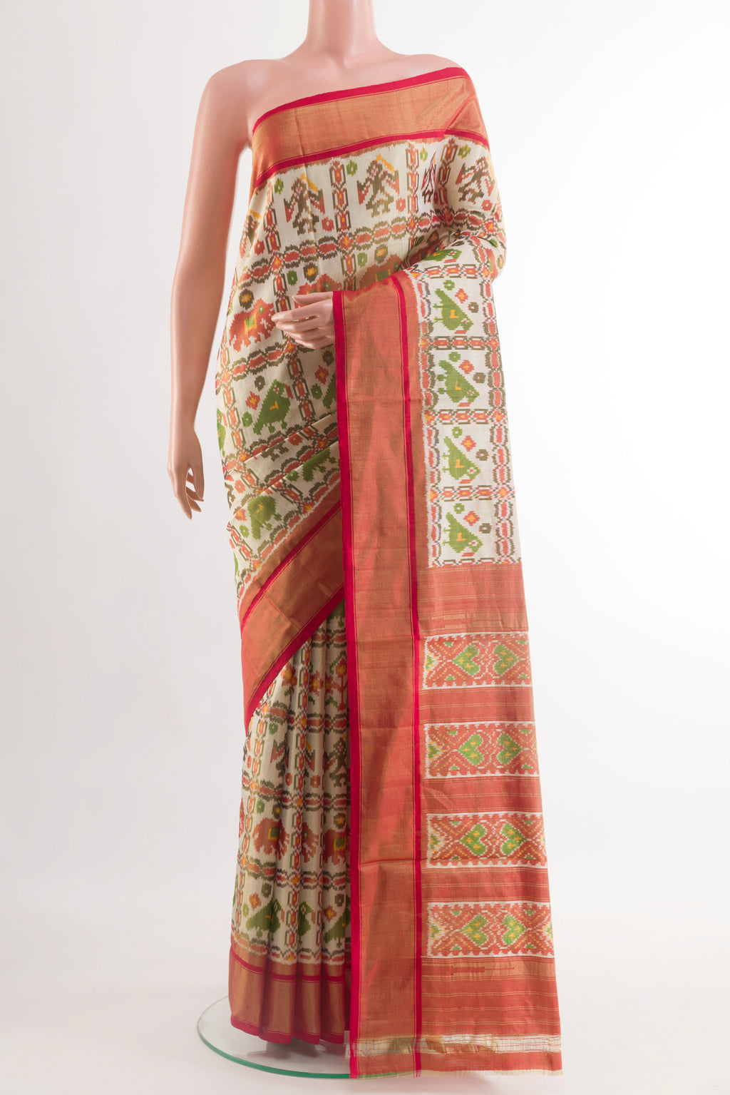 Off White Pochampally Silk Saree with Pure Ikat on the body and Zari Border.  displayed on a mannequin