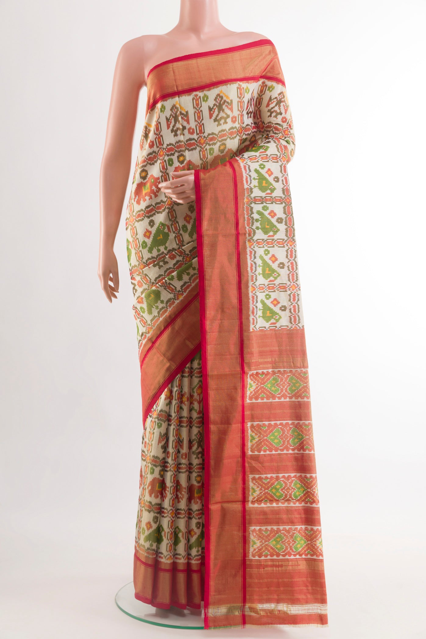 Off White Pochampally Silk Saree with Pure Ikat on the body and Zari Border.  displayed on a mannequin
