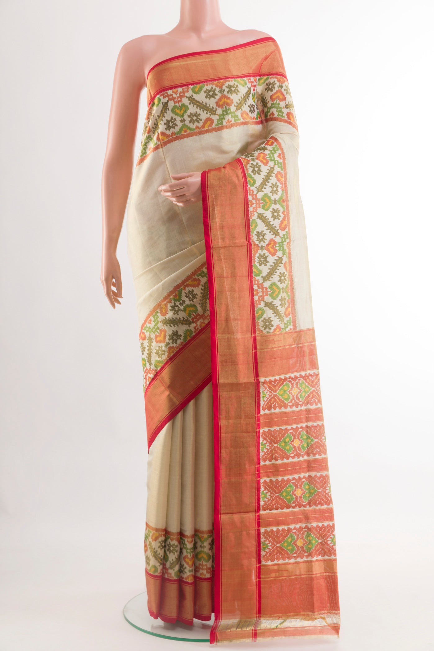 Off White Pochampally Silk Saree with Plain Body and Zari Border.  displayed on a mannequin