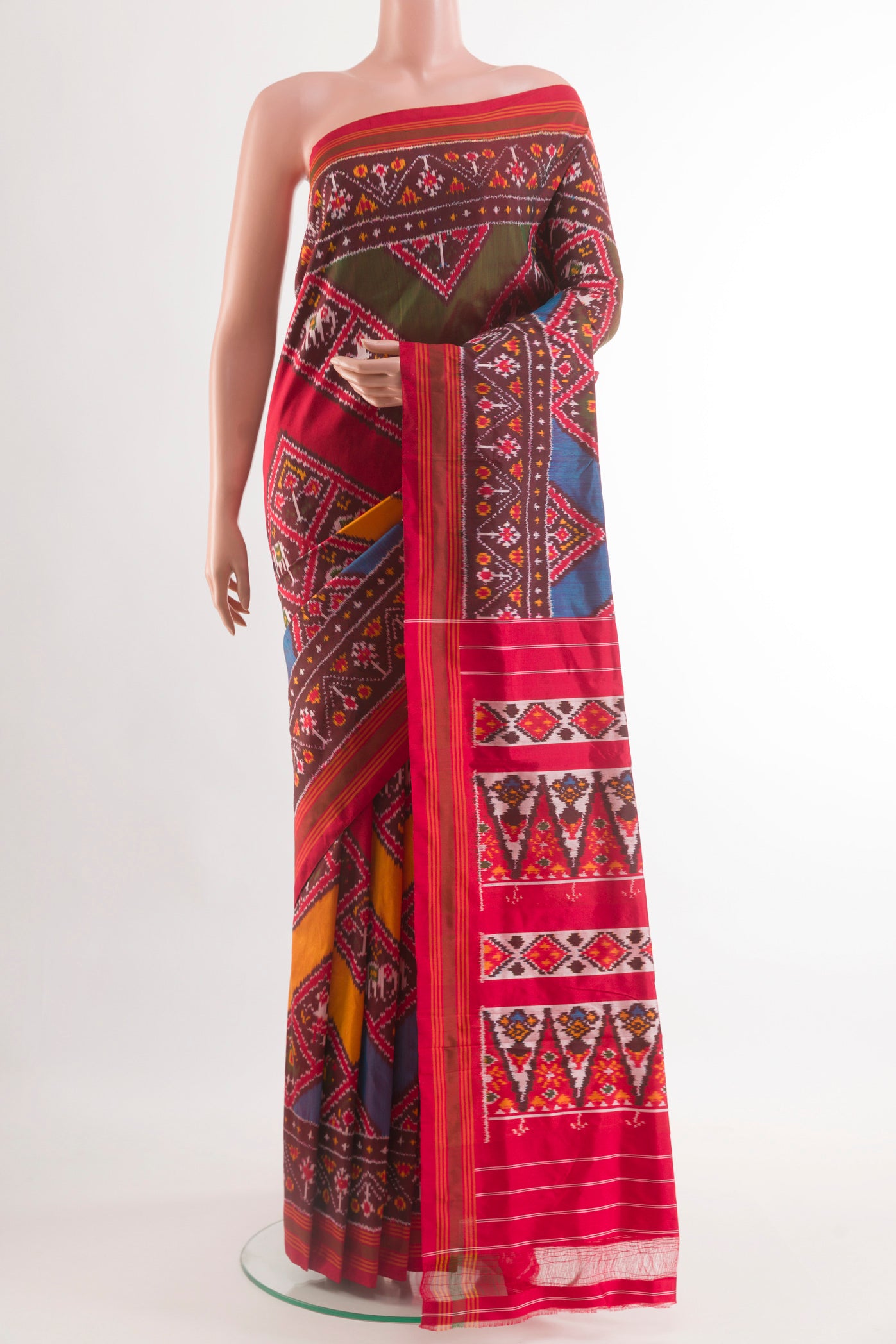 Red Pochampally Silk Saree with Pure Ikat on the body and Zari Border.  displayed on a mannequin