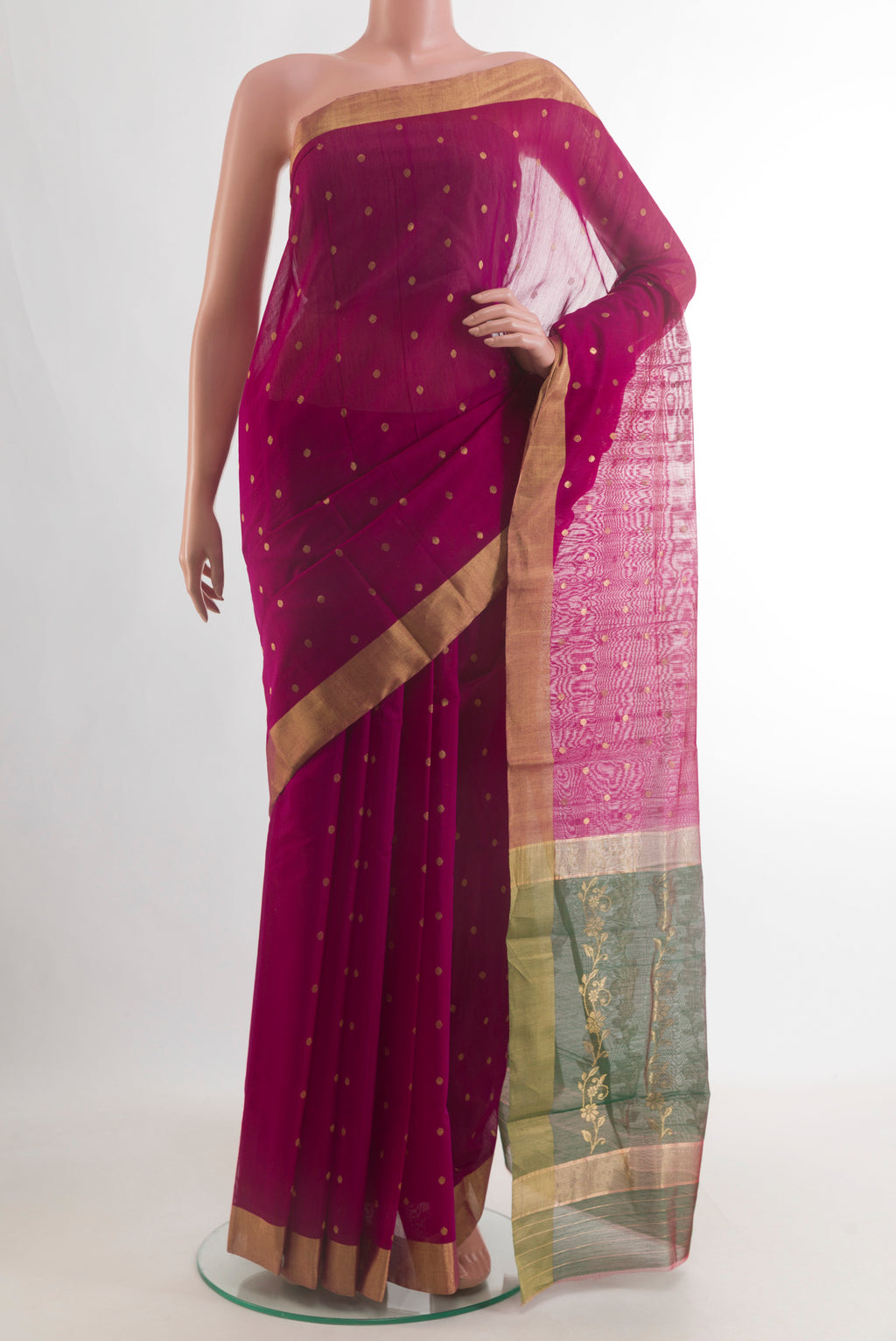Magenta Chanderi Cotton Saree with Zari Butta on the body and Zari Border.  displayed on a mannequin