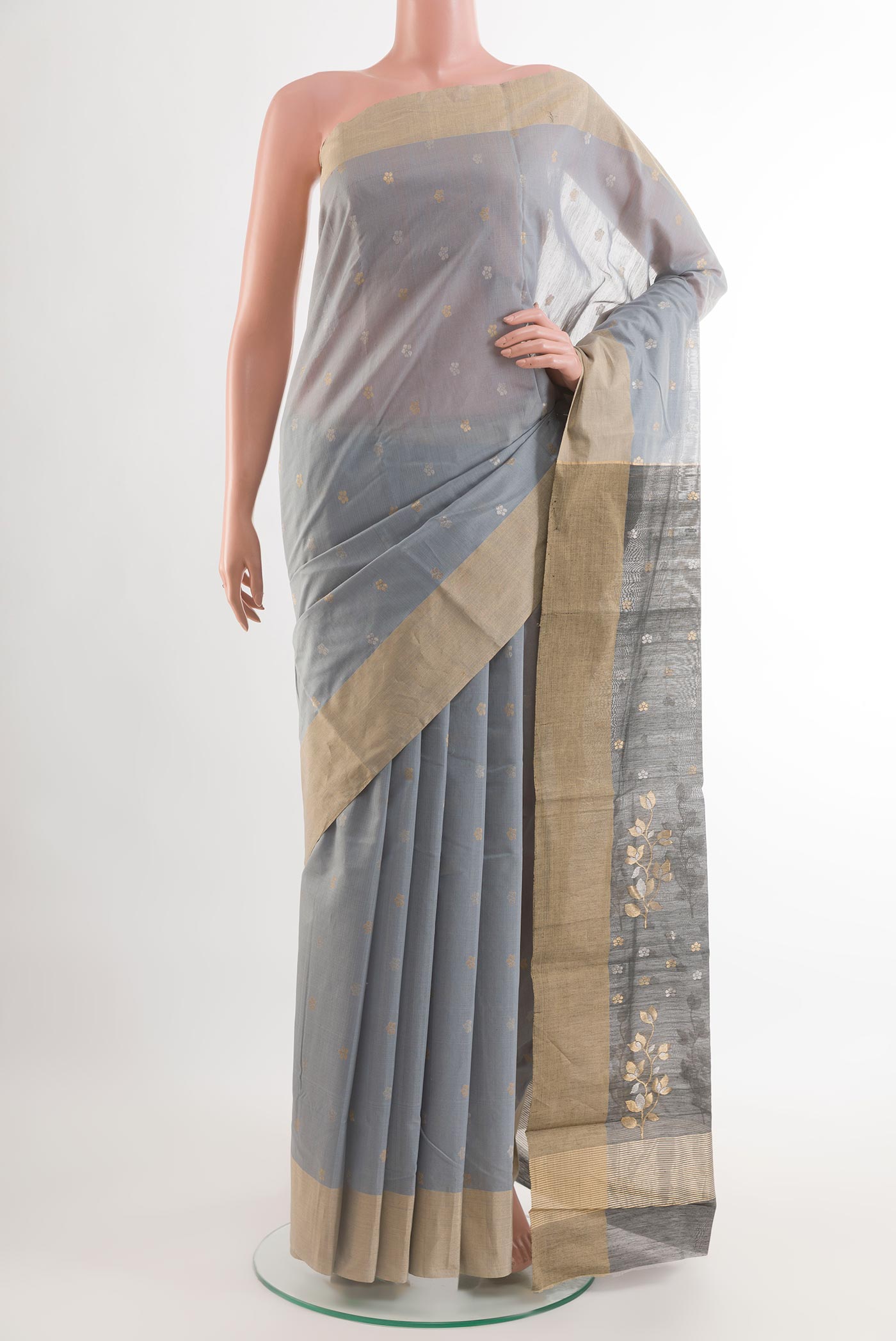 Grey Chanderi Silk Saree with Zari Butta on the body and Zari Border.  displayed on a mannequin