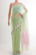 Mint Green Chanderi Silk Saree with Zari Butta on the body and Zari Border.  displayed on a mannequin