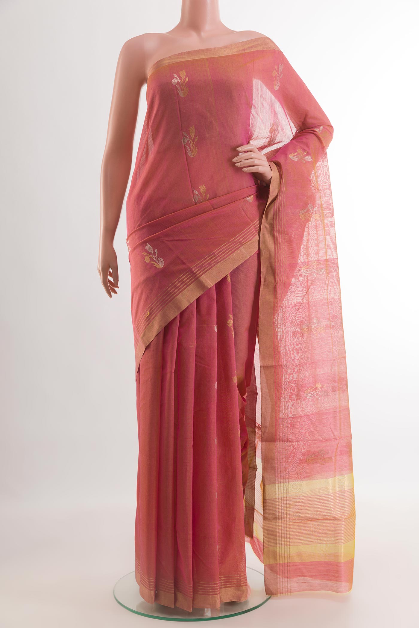 Peach Blended Chanderi Silk Cotton Saree with Zari Butta on the body and Zari Border.  displayed on a mannequin